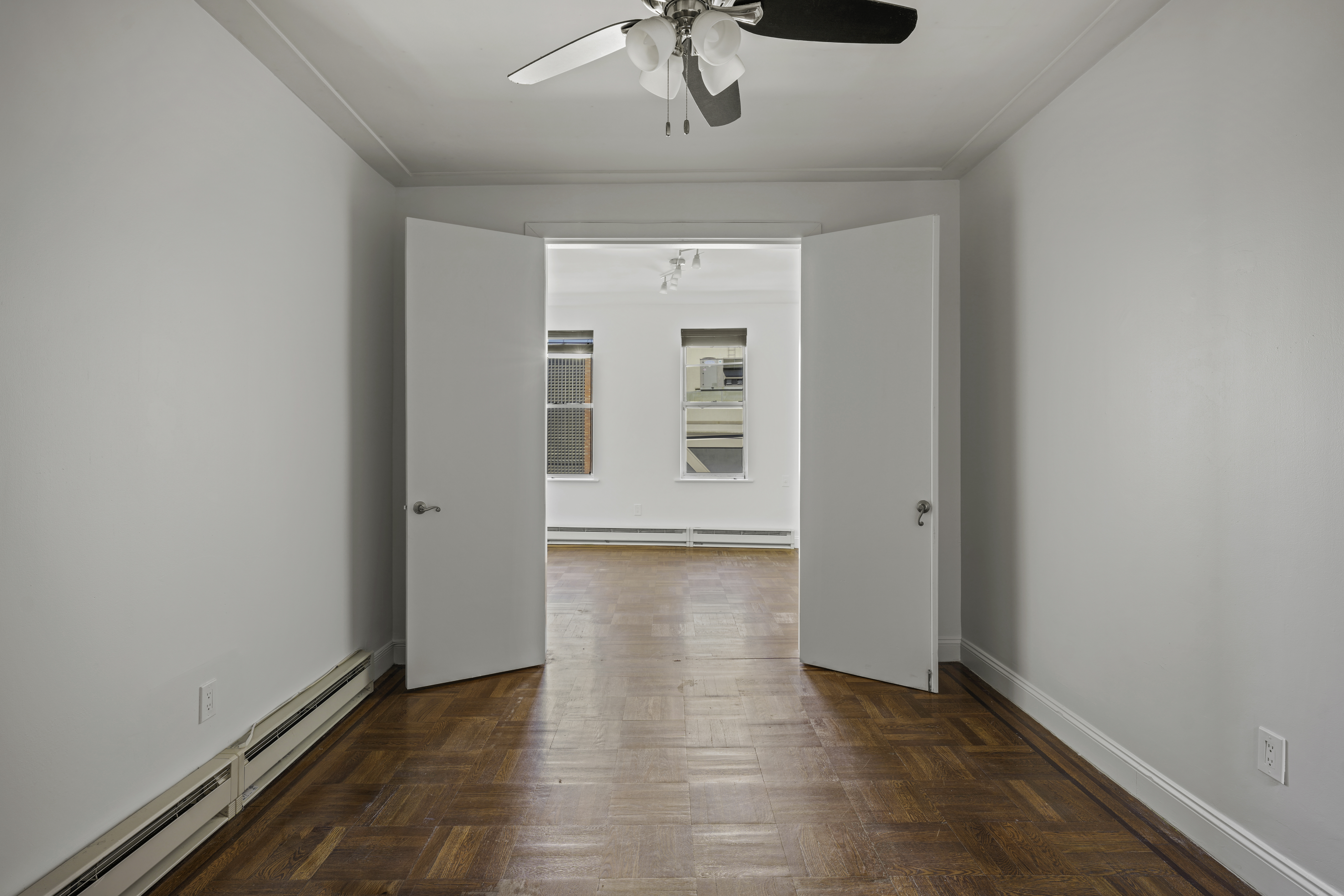 514 86th Street, Unit 4 Brooklyn, NY 11209 - Photo 6 of 19 a view of an empty room with a window