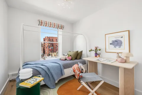 a bathroom with a granite countertop sink a toilet and bathtub