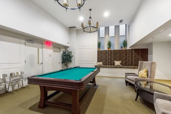 a dining room with furniture and a table