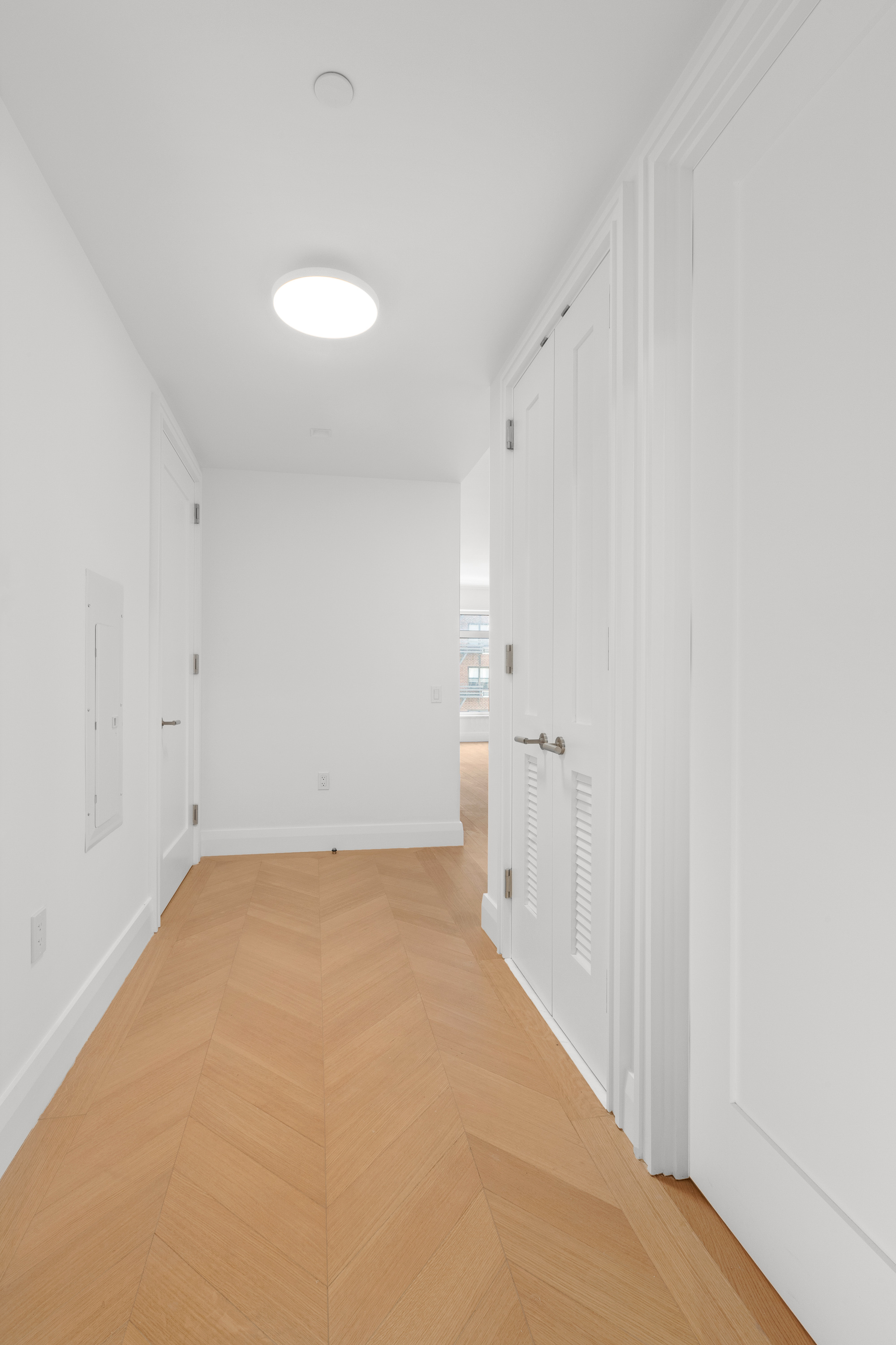 200 East 83rd Street, Unit 5D Manhattan, NY 10028 - Photo 15 of 29 a view of a room with a hallway