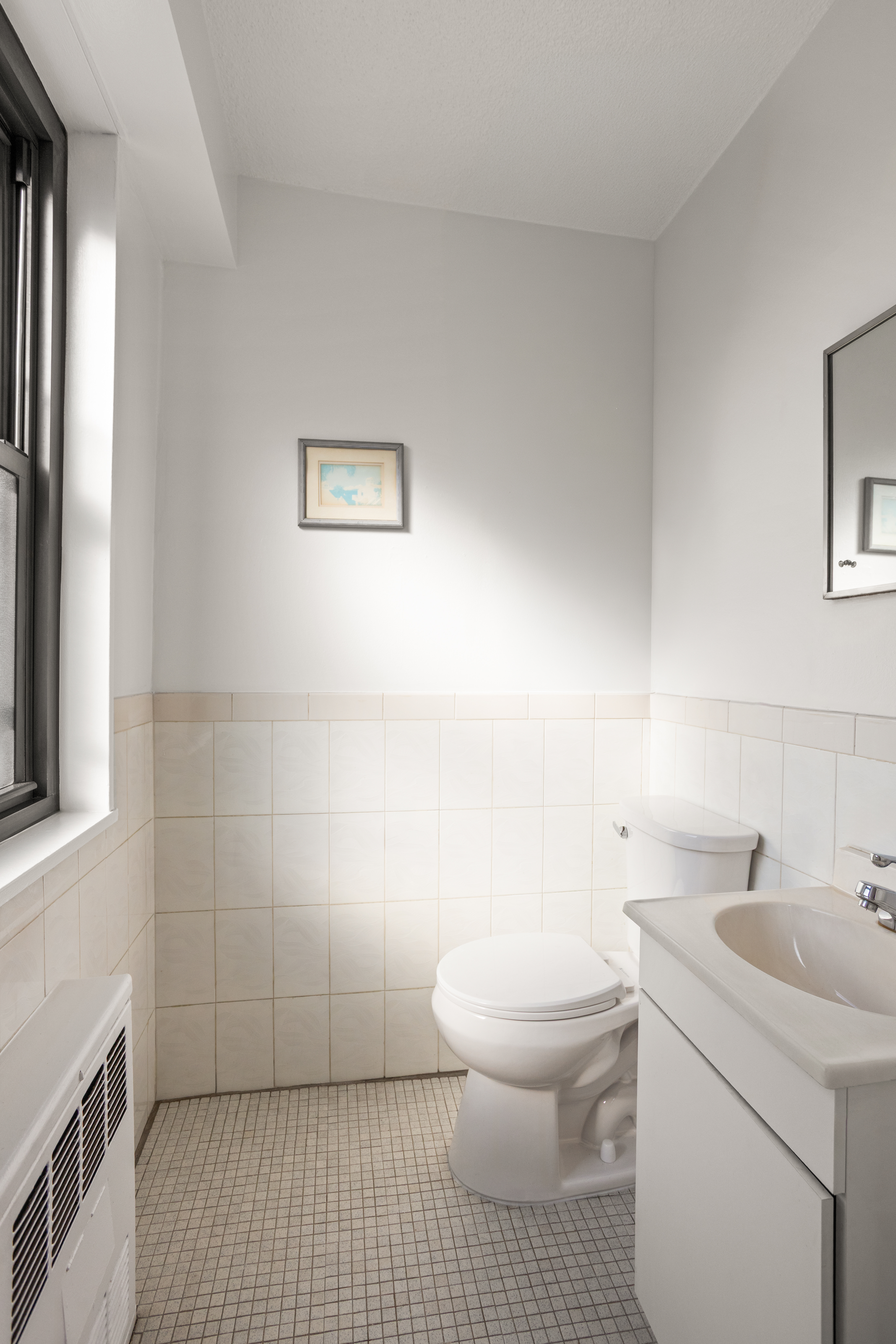 39-60 54th Street, Unit 4R Queens, NY 11377 - Photo 5 of 14 a bathroom with a toilet a sink and shower