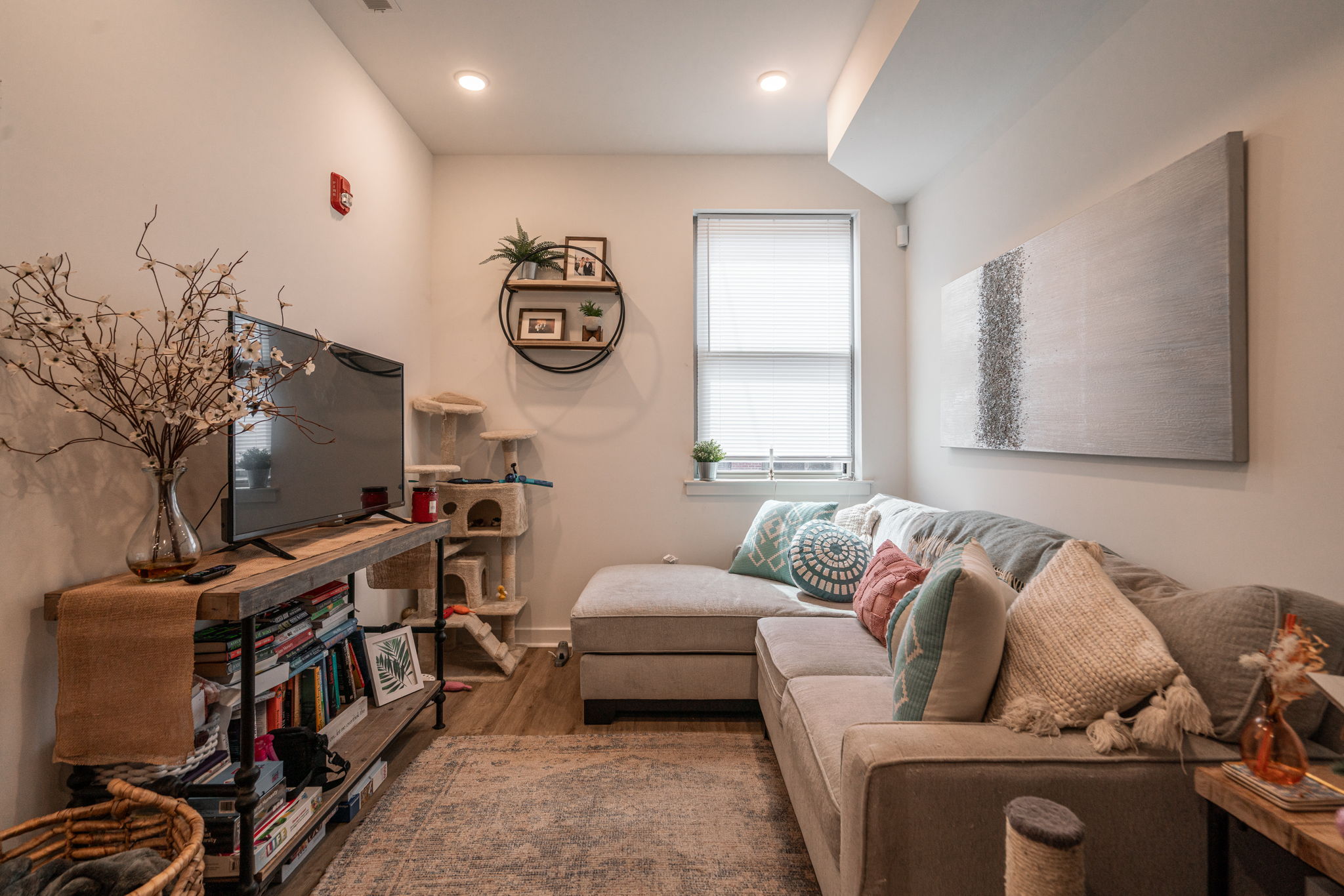 2613 Federal Street, Unit B Philadelphia, PA 19146 - Photo 4 of 21 a living room with furniture and a flat screen tv