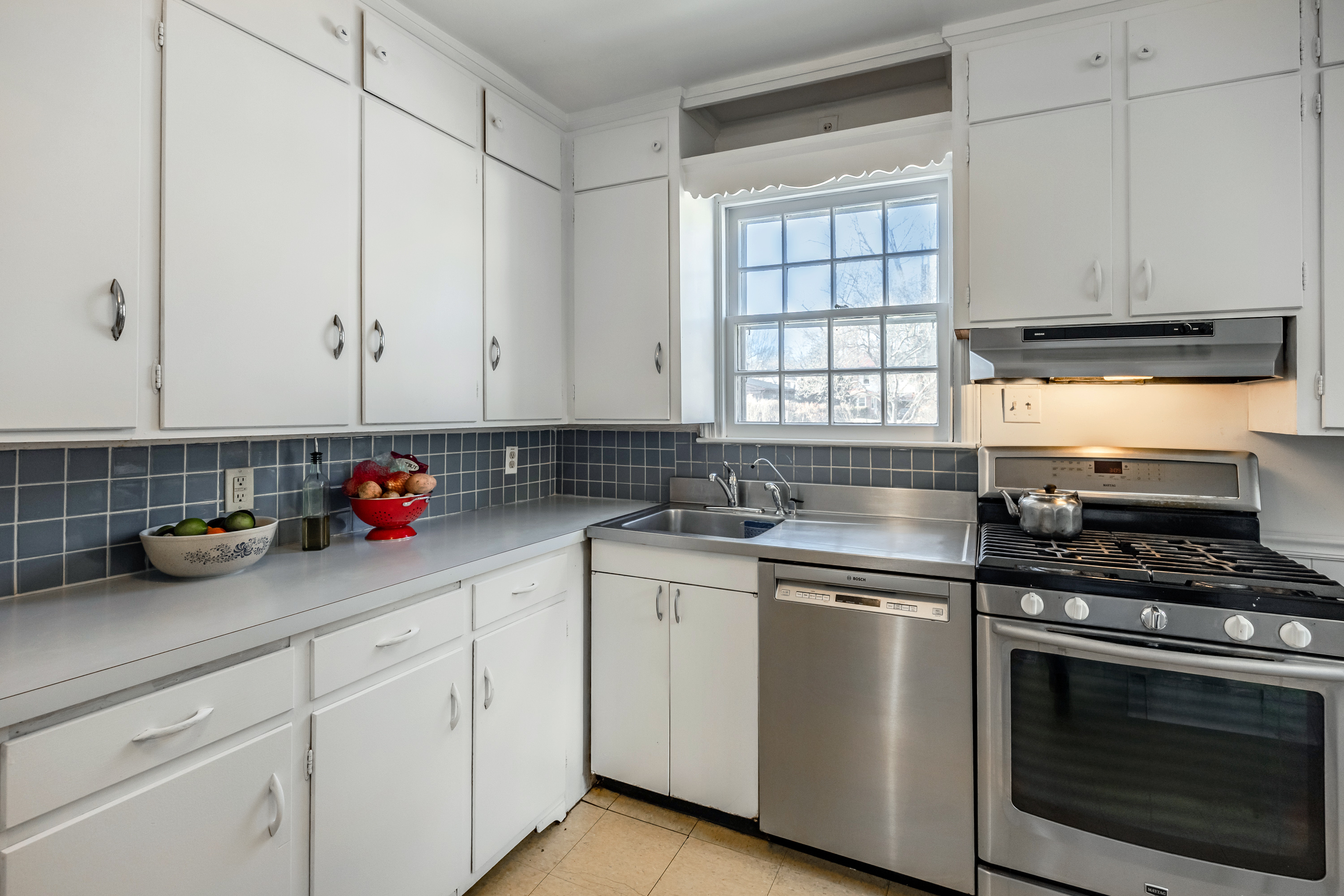 14 Decatur Road Havertown, PA 19083 - Photo 16 of 43 a kitchen with cabinets appliances and a window