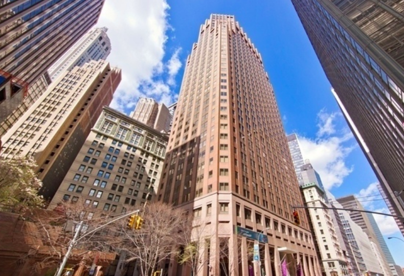 75 Wall Street, Unit 26D Manhattan, NY 10005 - Photo 10 of 11 a view of a tall building