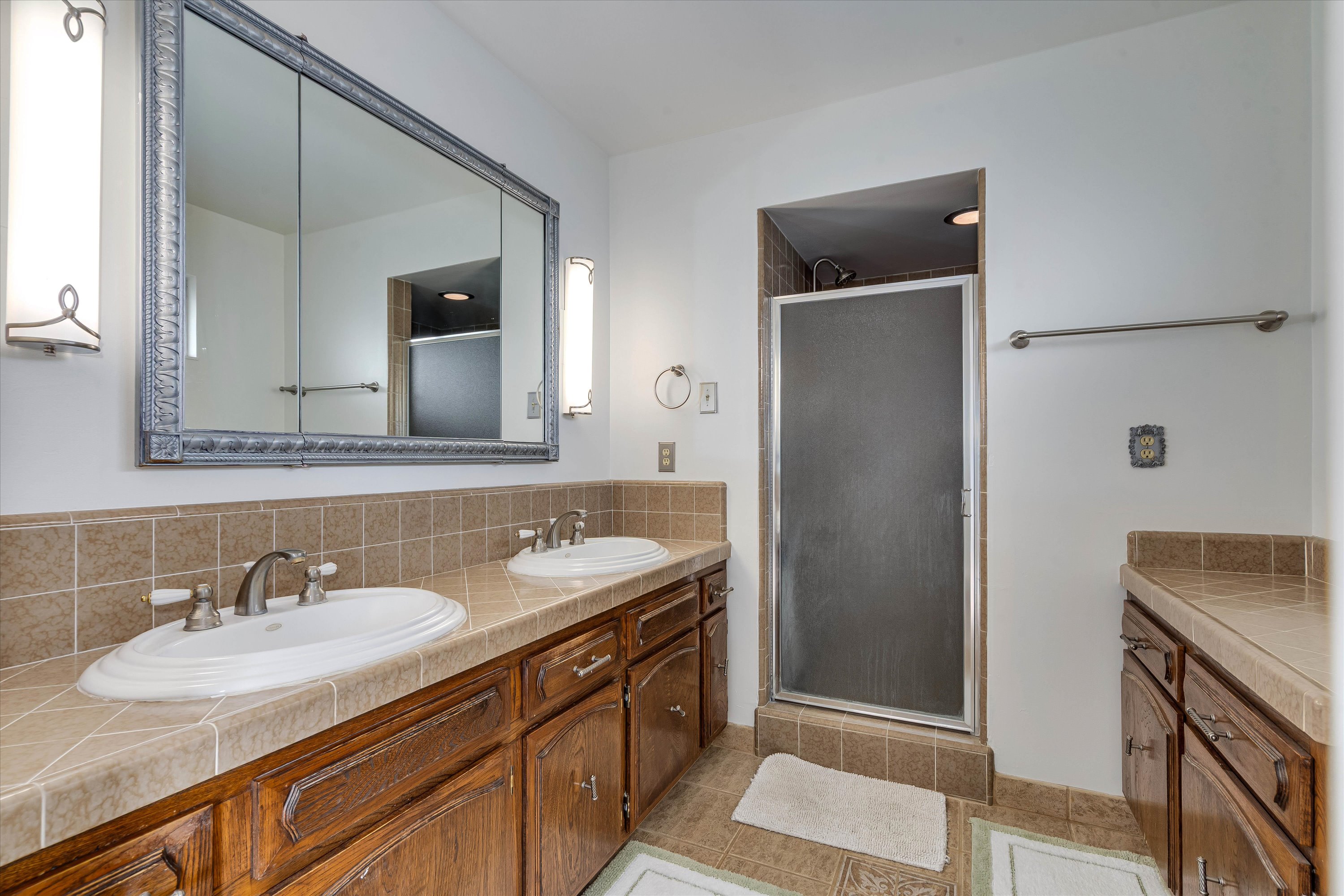 1291 Rockland Drive St. Helena, CA 94574 - Photo 14 of 26 a bathroom with a sink and a mirror