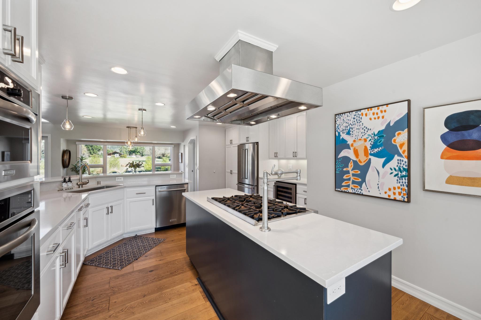 123 Frey Road Santa Rosa, CA 95409 - Photo 15 of 62 a kitchen that has a lot of cabinets in it