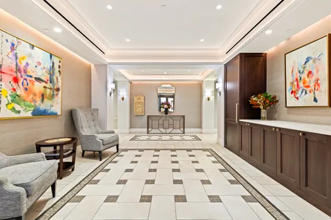 a living room with furniture and a rug