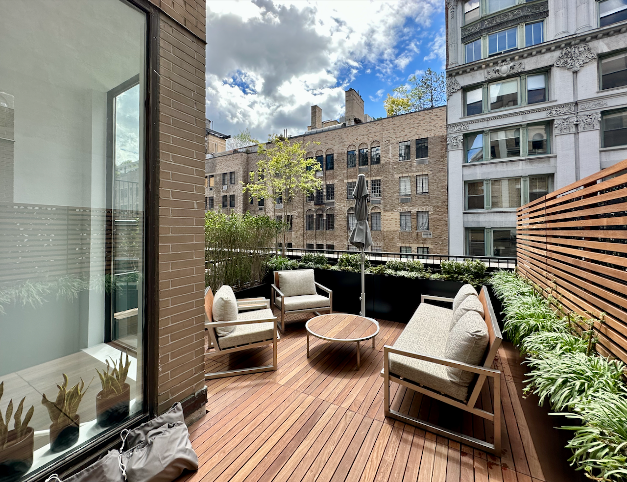 35 East 10th Street, Unit 4J Manhattan, NY 10003 - Photo 1 of 19 a view of a balcony with couch
