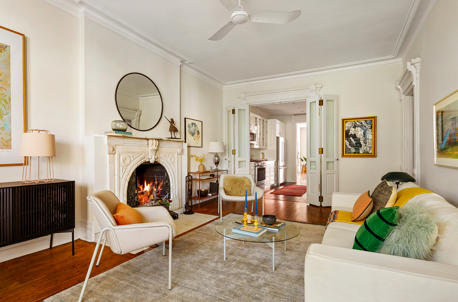 22 8th Avenue, Unit 3 Brooklyn, NY 11217 - Photo 5 of 14 a living room with furniture a fireplace and window