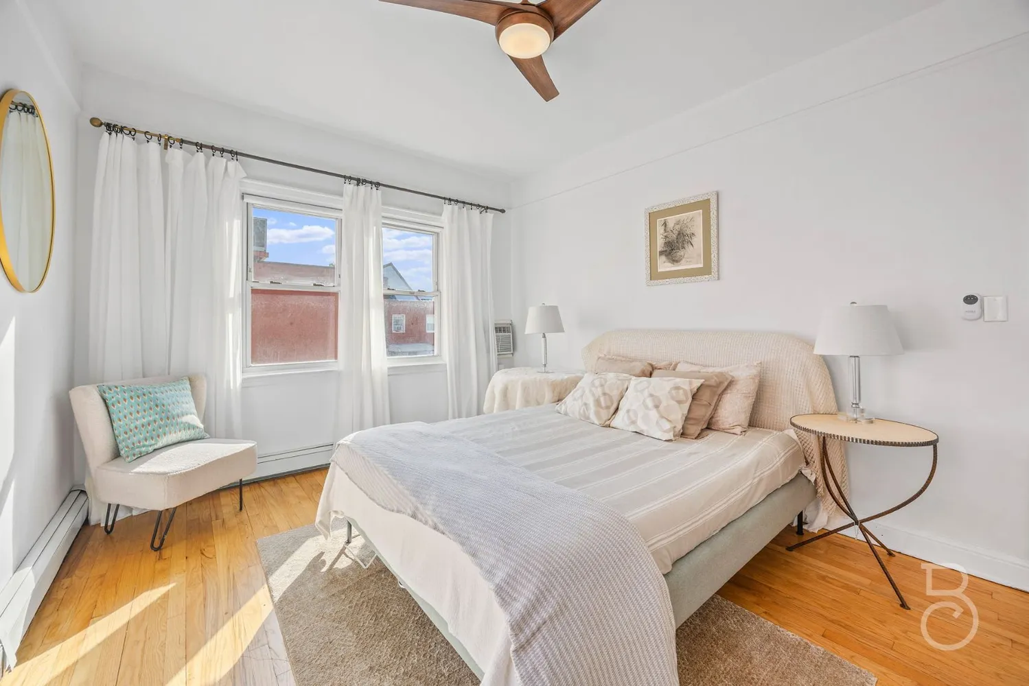 a bedroom with a bed and window