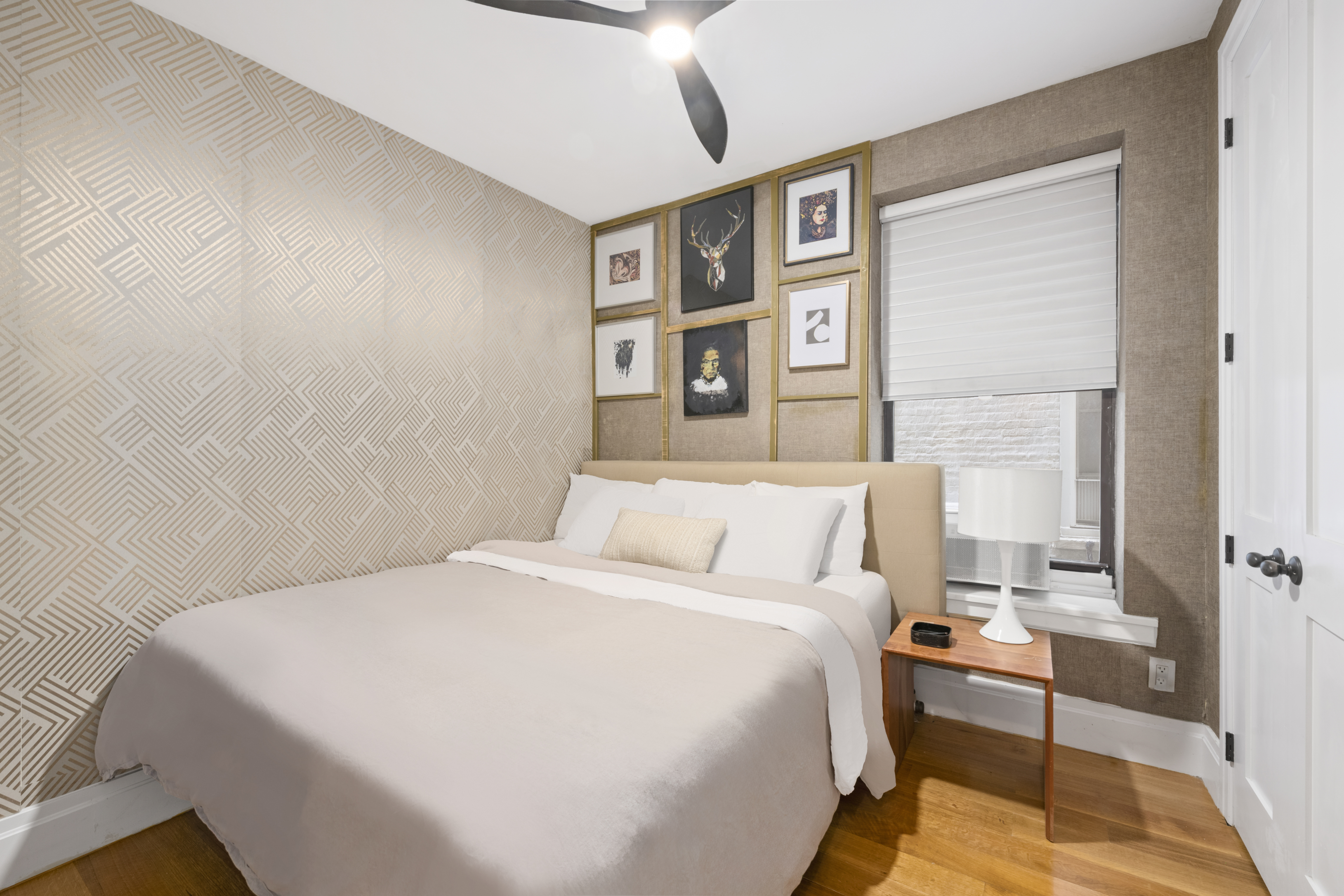 364 West 121st Street, Unit 2A Manhattan, NY 10027 - Photo 8 of 13 a bedroom with a bed and a desk