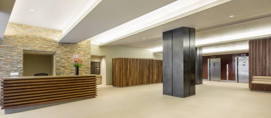 100 West 93rd Street, Unit 6E Manhattan, NY 10025 - Photo 3 of 7 a view of a hallway with wooden floor and a bathroom
