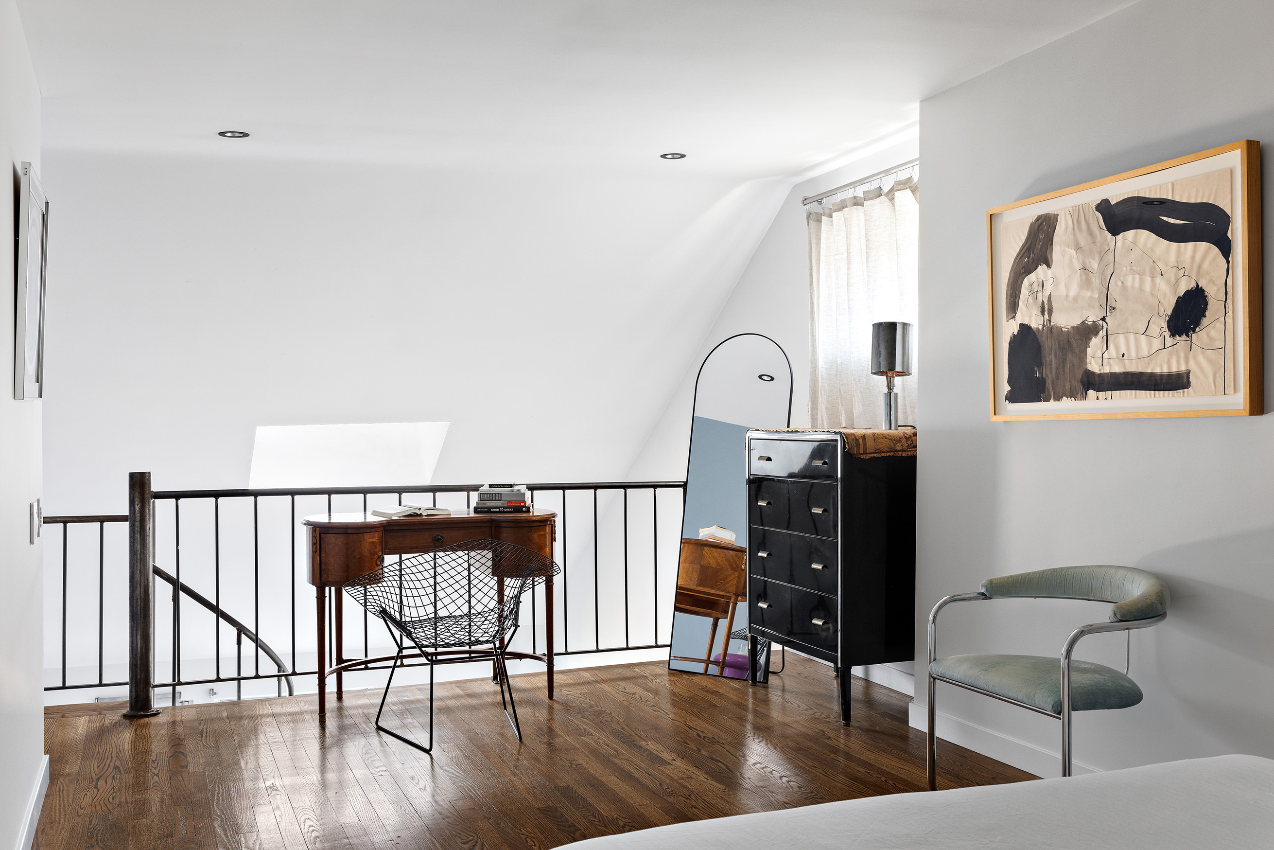 211 Thompson Street, Unit PH6D Manhattan, NY 10012 - Photo 8 of 10 a view of a balcony with chairs and wooden floor