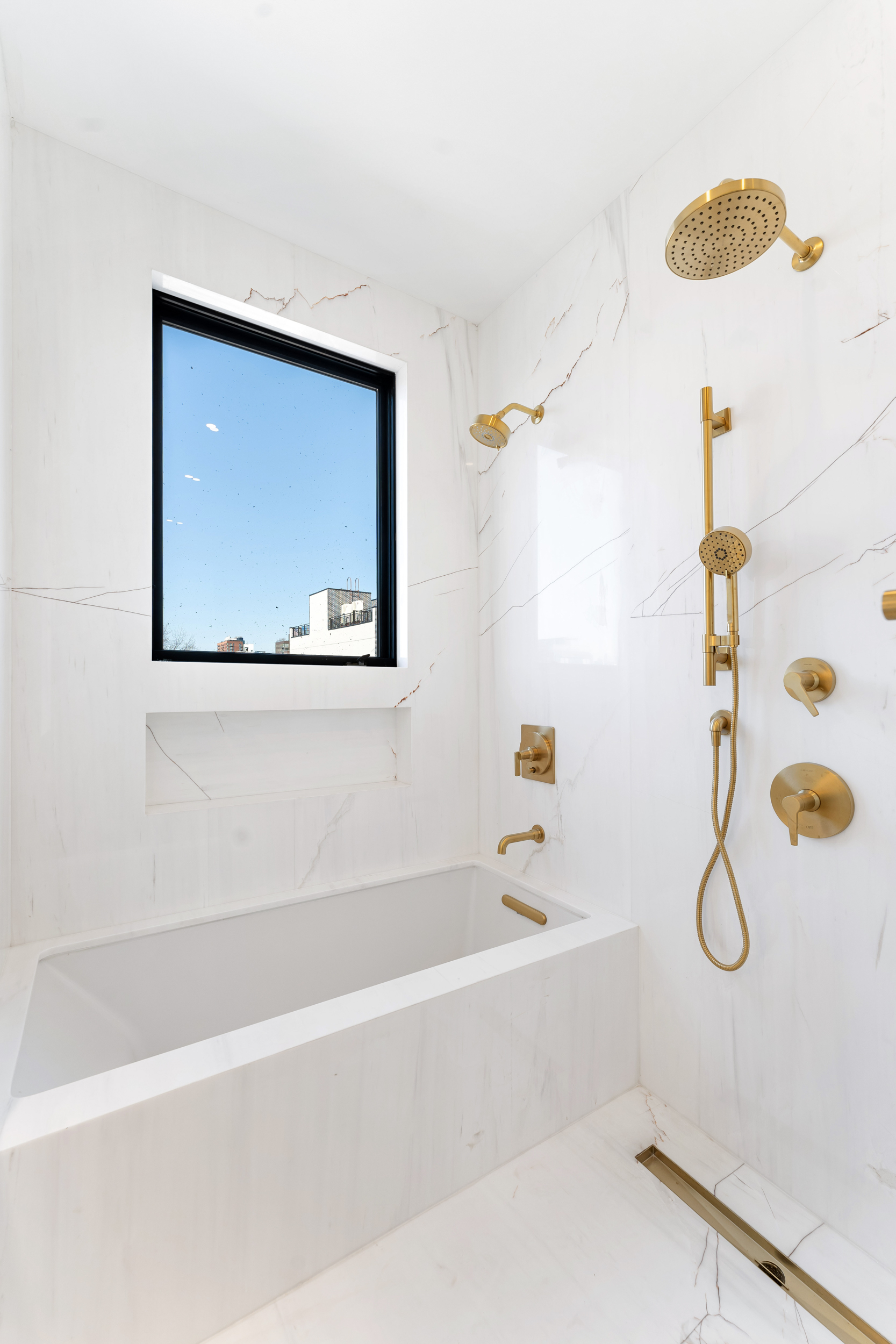 167 13th Street, Unit PH Brooklyn, NY 11215 - Photo 11 of 14 a bathroom with a bathtub and shower