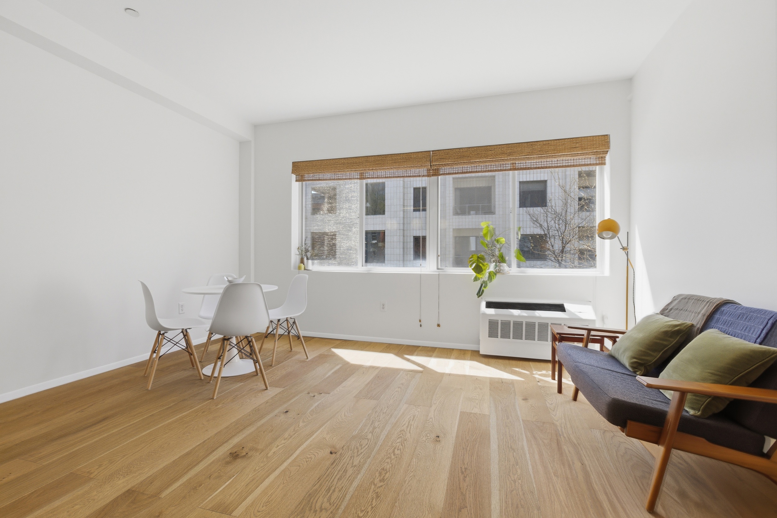 433 Warren Street, Unit 2C Brooklyn, NY 11217 - Photo 2 of 19 a living room with furniture and a table