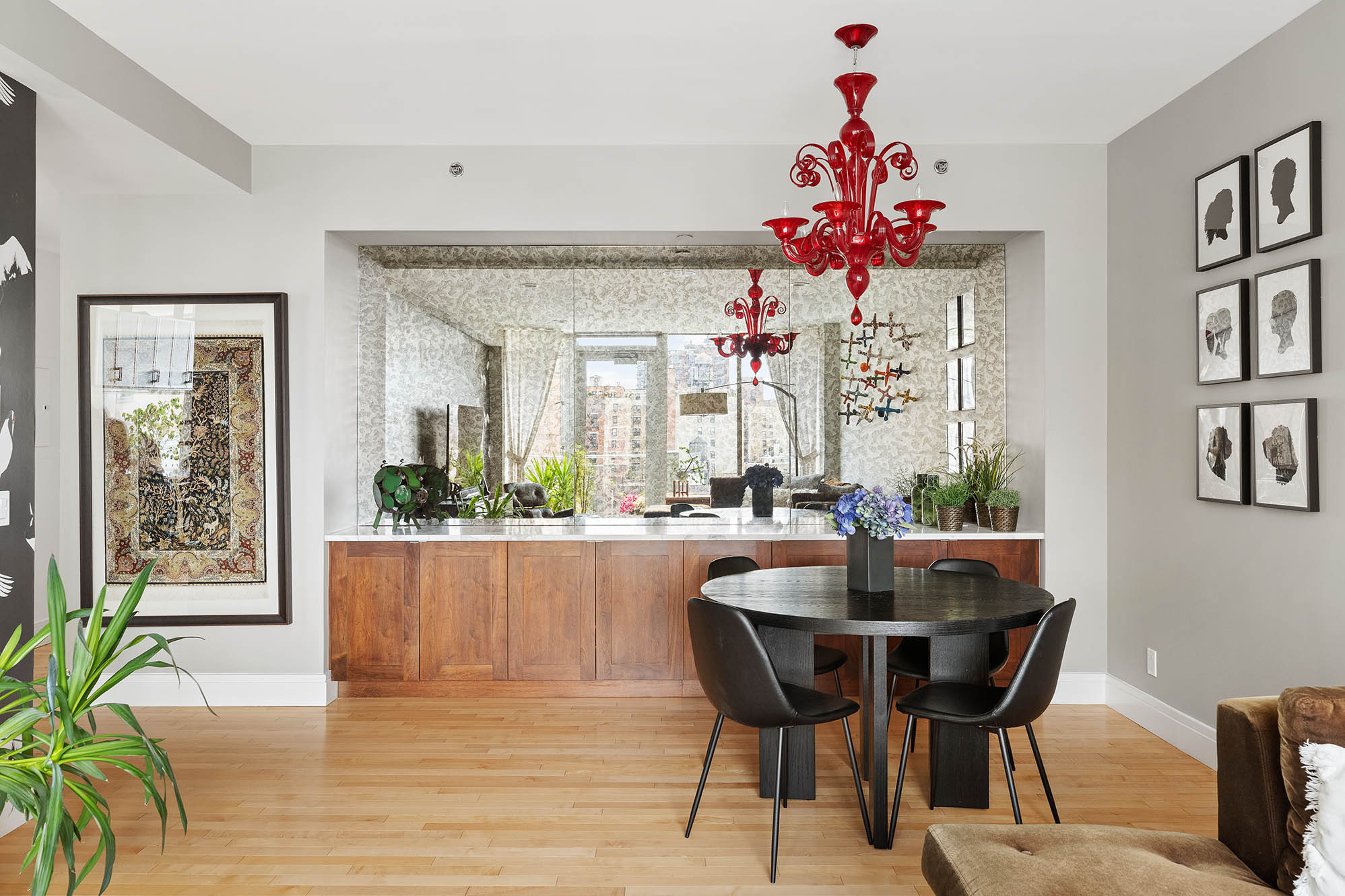 545 West 110th Street, Unit PH11A Manhattan, NY 10025 - Photo 8 of 22 a view of a dining room with furniture and a chandelier