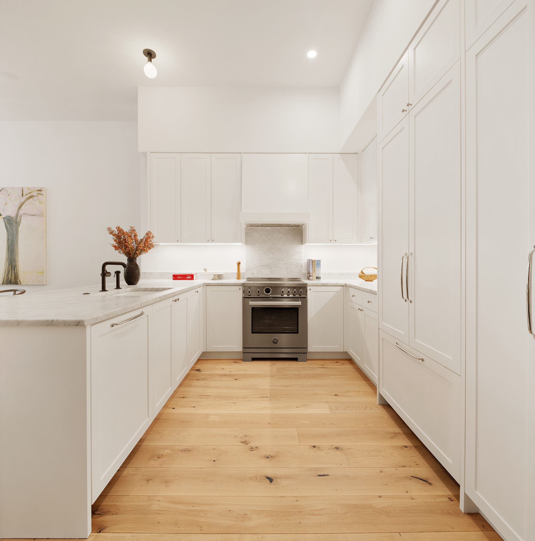 524 Halsey Street, Unit TH1 Brooklyn, NY 11233 - Photo 4 of 17 a kitchen with a sink window and cabinets