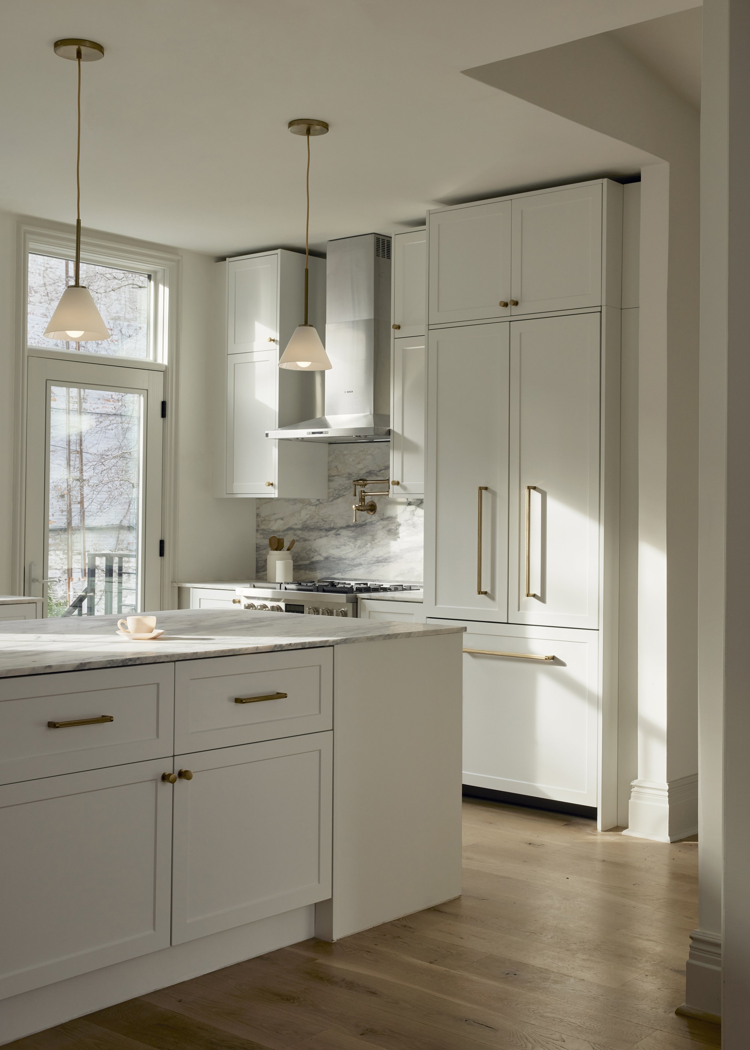 146 1/2 Java Street Brooklyn, NY 11222 - Photo 11 of 23 a kitchen with white cabinets and sink