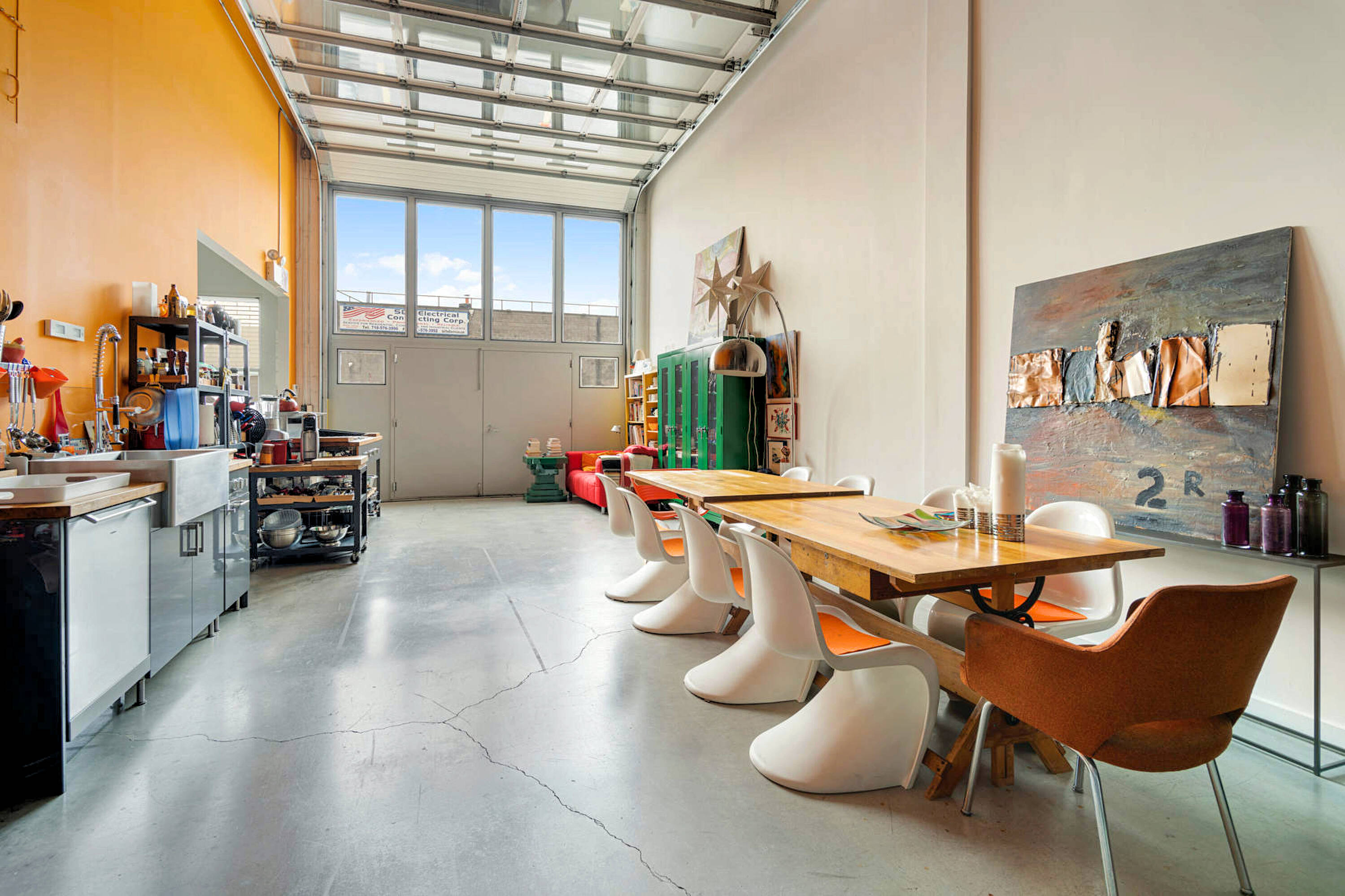 251 Montrose Avenue Brooklyn, NY 11206 - Photo 4 of 15 a dining room with furniture and a large window