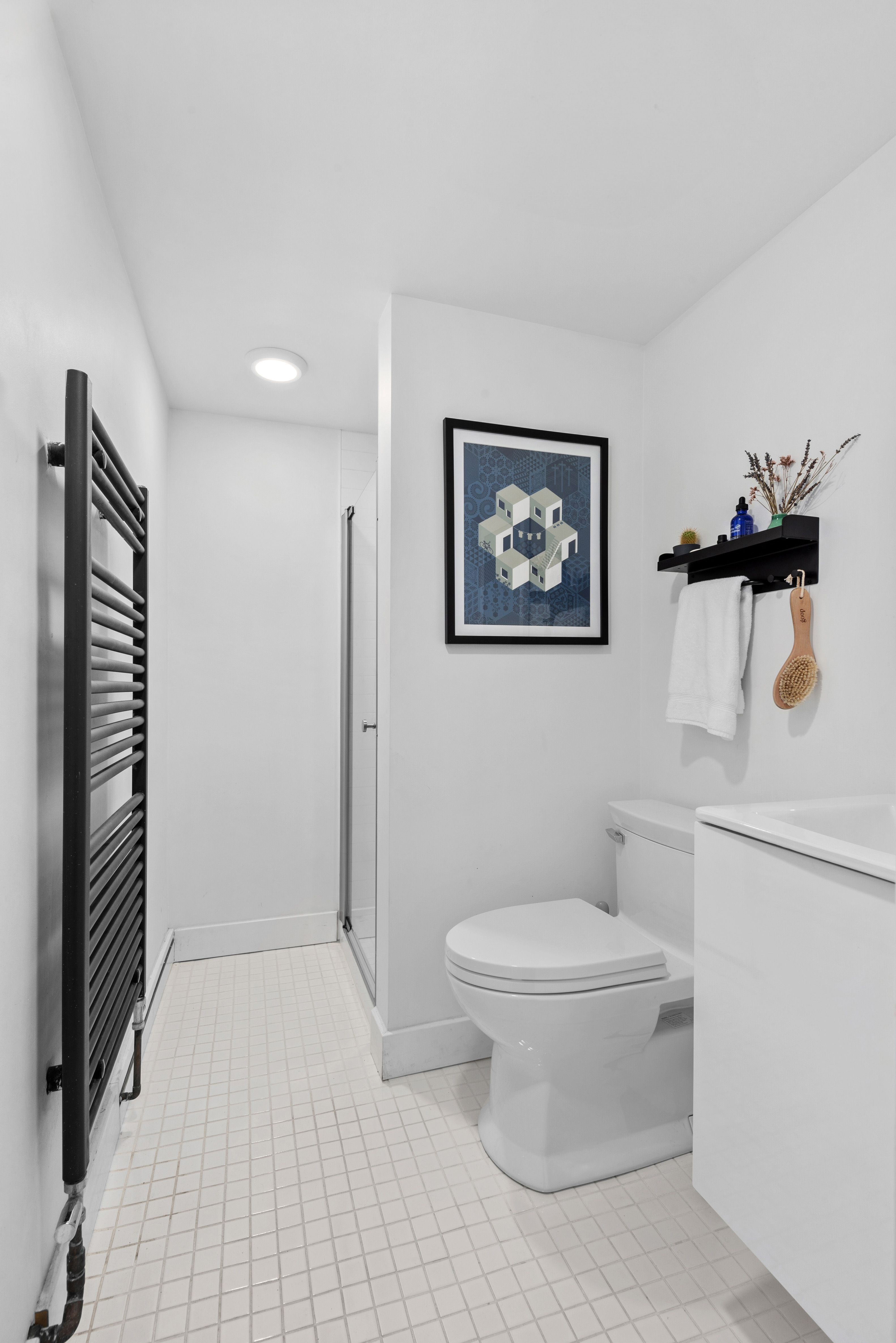 110 North 9th Street, Unit TH1 Brooklyn, NY 11249 - Photo 6 of 14 a bathroom with a toilet and a shower