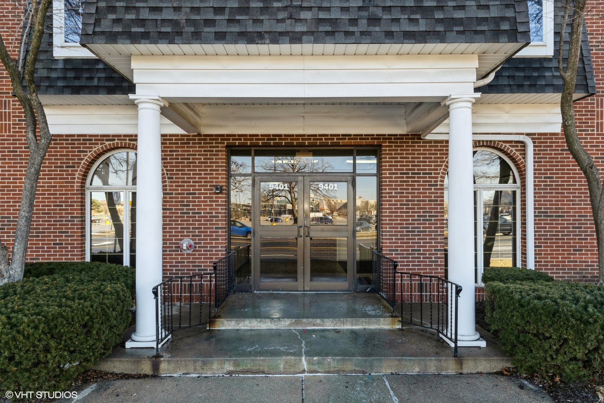 9401 South Pulaski Road, Unit 3N Evergreen Park, IL 60805 - Photo 2 of 12 a front view of a house with a porch