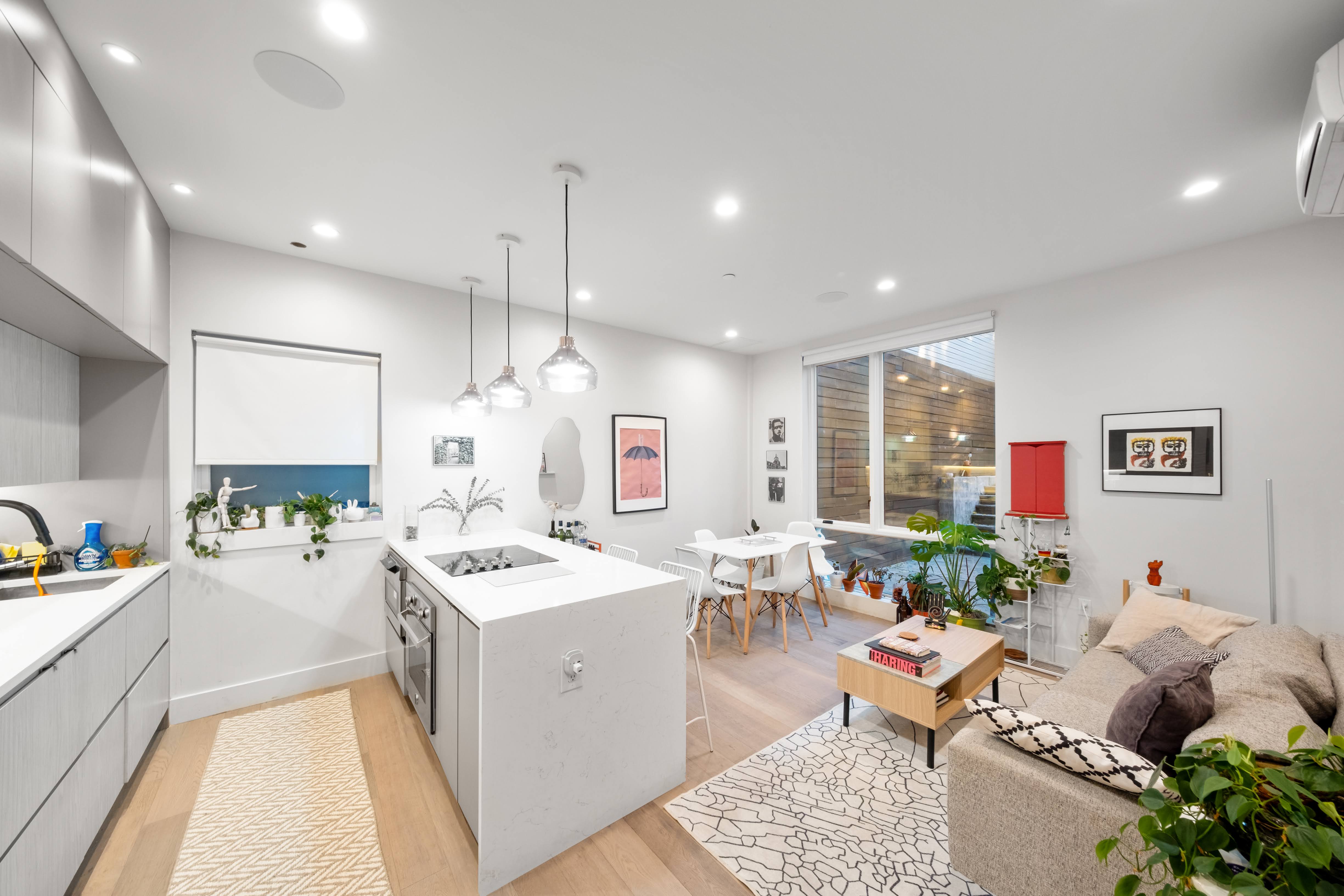 394 Harman Street, Unit 1B Brooklyn, NY 11237 - Photo 4 of 23 a very nice looking living room with a large window and a table