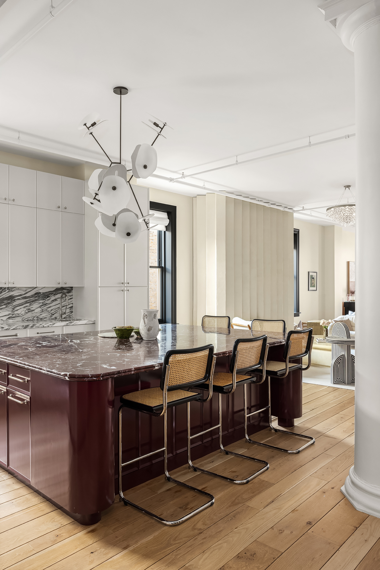 158 Mercer Street, Unit 6B Manhattan, NY 10012 - Photo 7 of 16 a view of a dining room with furniture and wooden floor