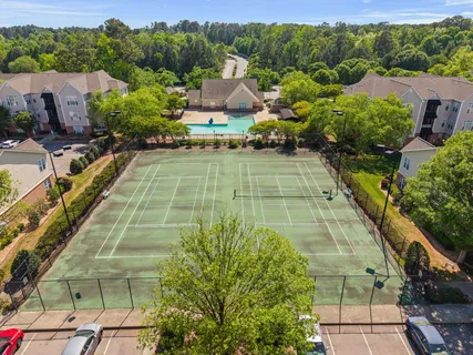 an aerial view of a house with a garden