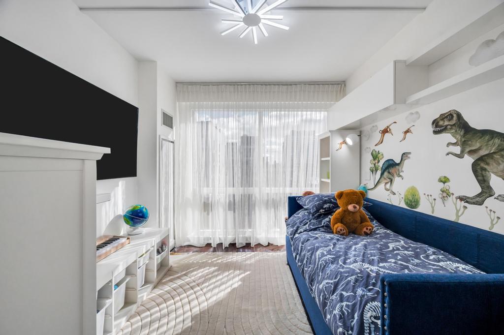 2628 Broadway, Unit 15B Manhattan, NY 10025 - Photo 13 of 22 a bedroom with a bed and a window
