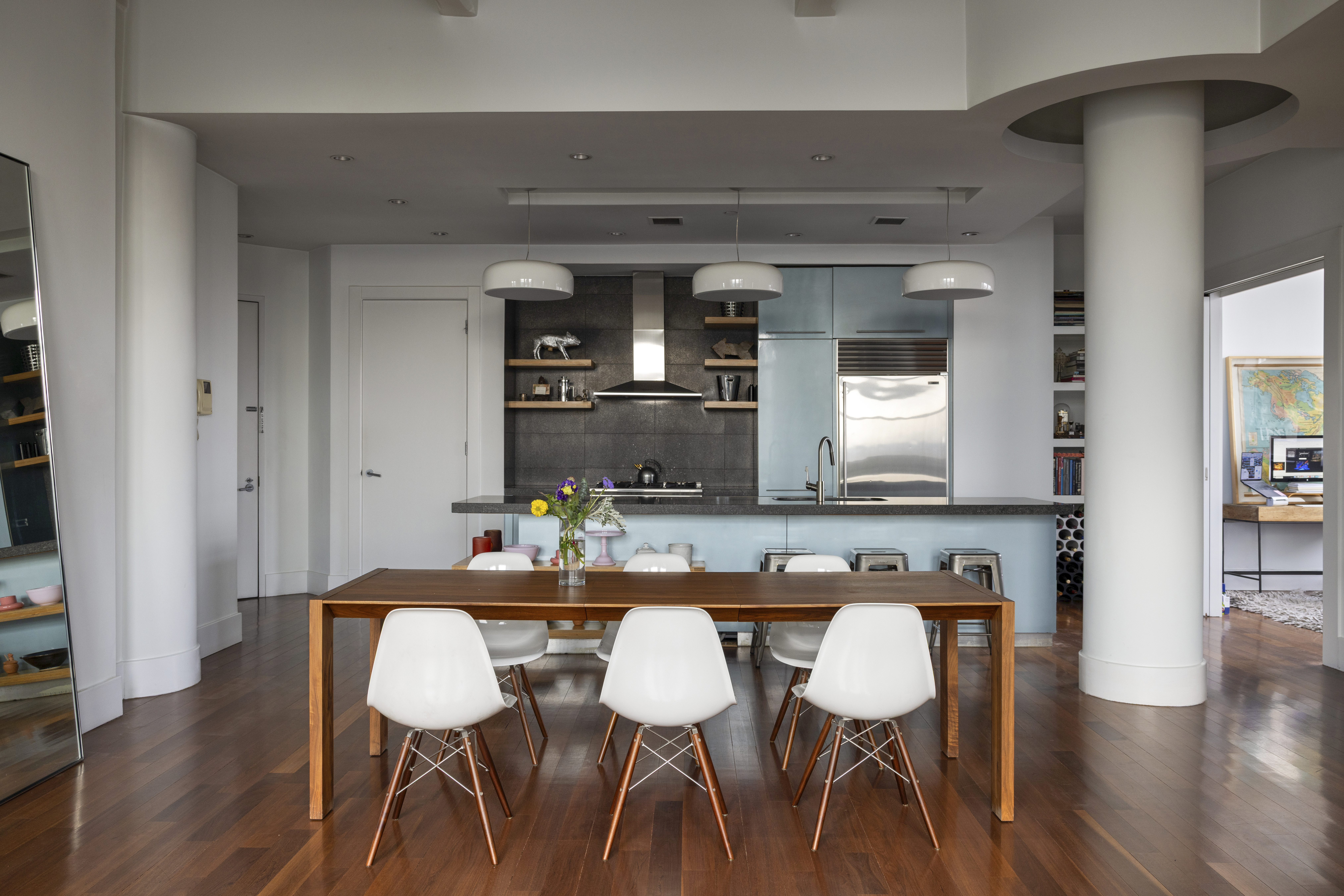 60 Broadway, Unit 8K Brooklyn, NY 11249 - Photo 4 of 10 a dining room with furniture and wooden floor