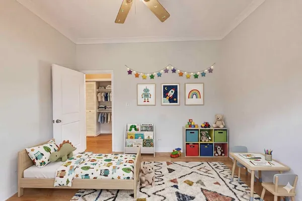 a bedroom with a bed and furniture