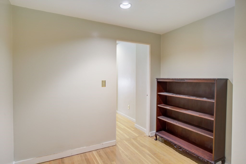 327 Commonwealth Avenue Boston, MA 02115 - Photo 22 of 26 a view of closet area with wooden floor