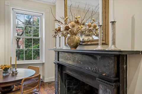 a table with a vase of flowers on it