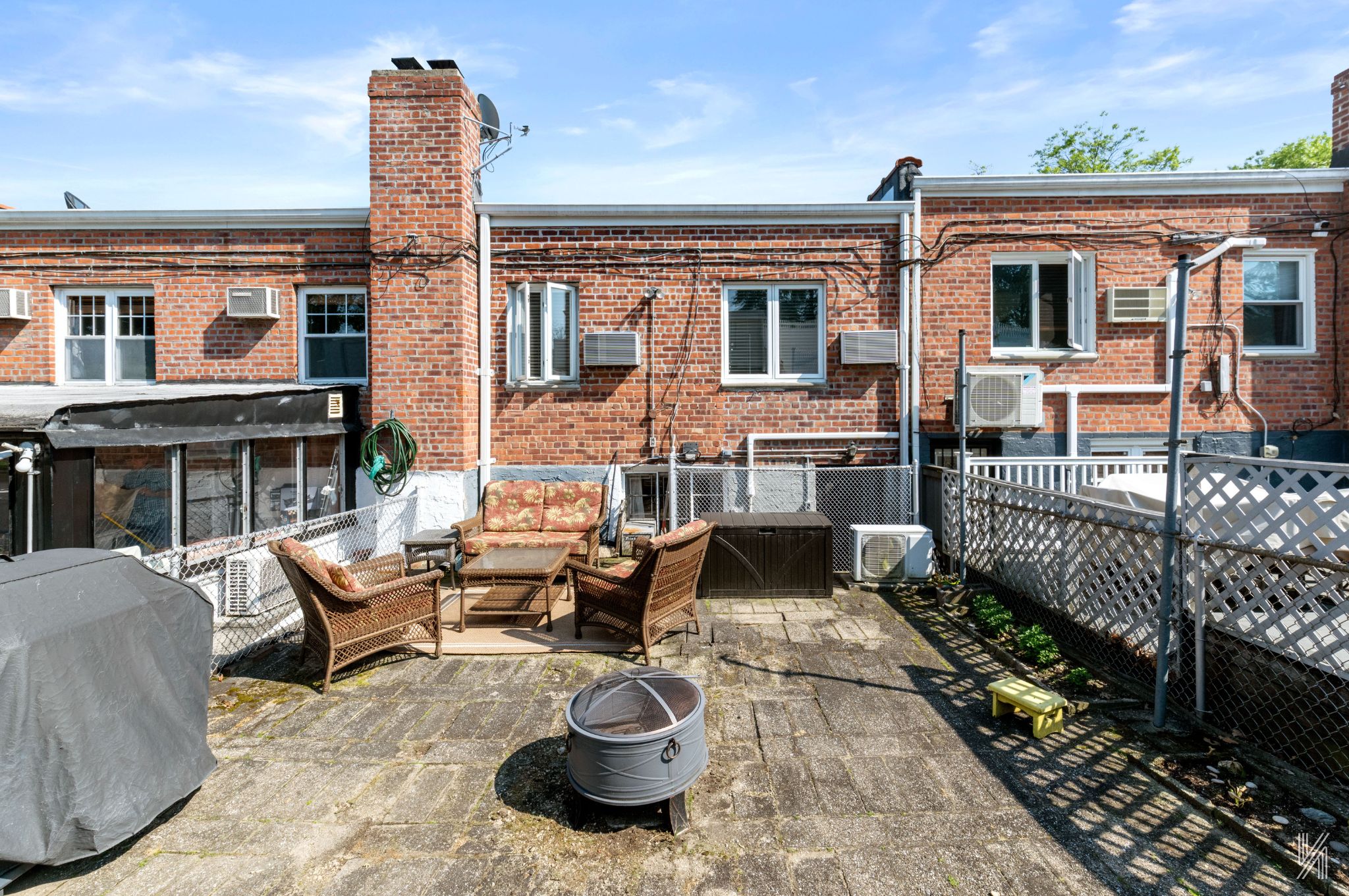 67-17 Eliot Avenue Queens, NY 11379 - Photo 20 of 21 a view of a patio with couches chairs and wooden floor
