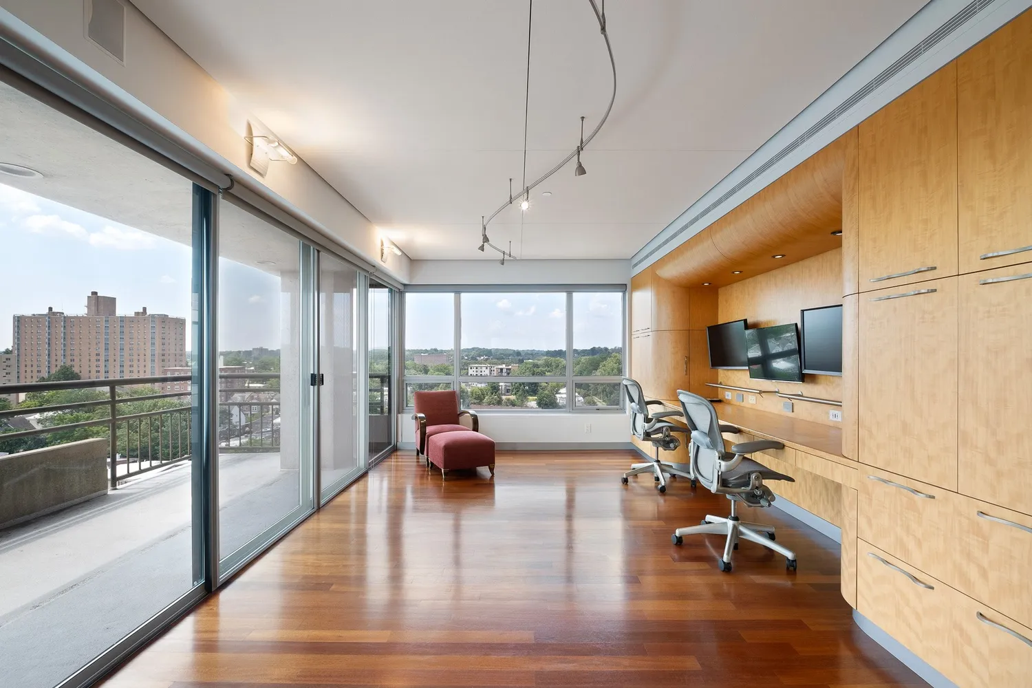 a kitchen with stainless steel appliances granite countertop a sink and a refrigerator