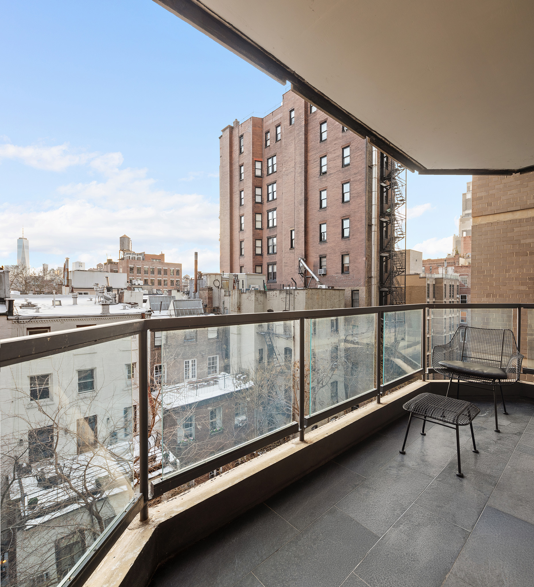 37 West 12th Street, Unit 7J Manhattan, NY 10011 - Photo 3 of 18 a view of a balcony with chairs