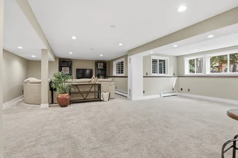 a large room with furniture and windows