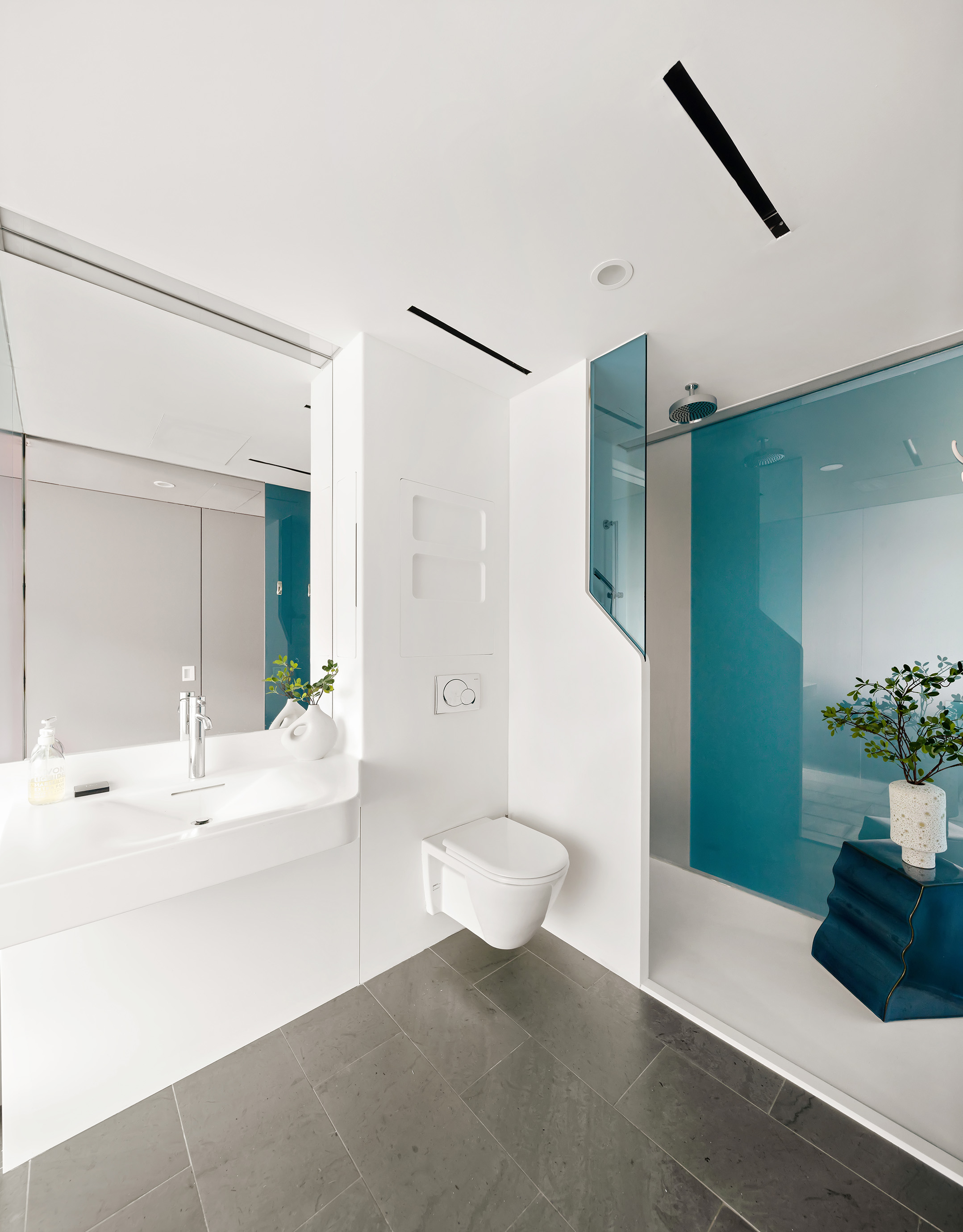 166 Perry Street, Unit 4B Manhattan, NY 10014 - Photo 8 of 14 a bathroom with a sink and a mirror