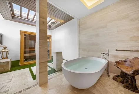 a view of a bathtub in bathroom