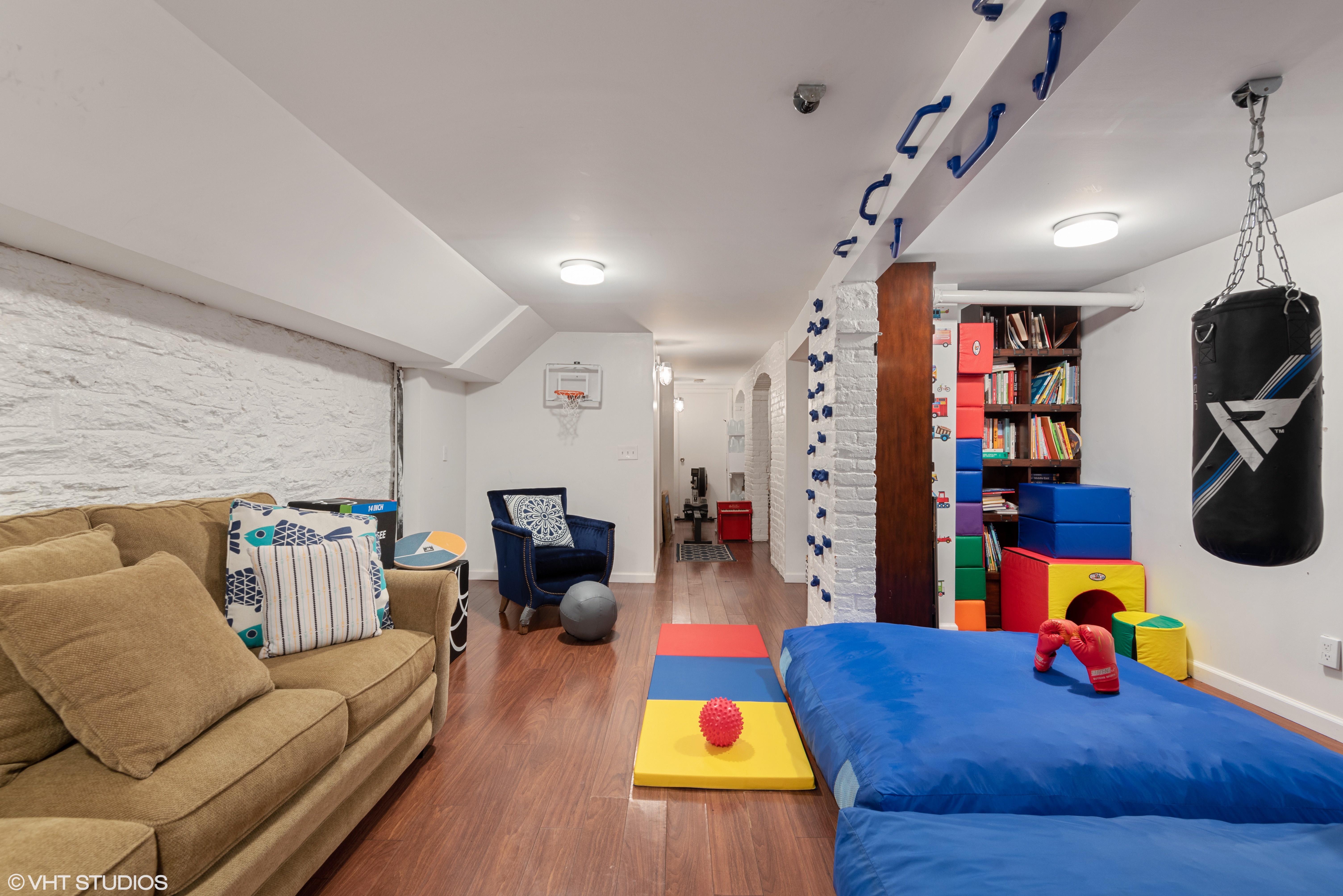 353 West 120th Street, Unit 1 Manhattan, NY 10027 - Photo 5 of 8 a living room with furniture and a couch