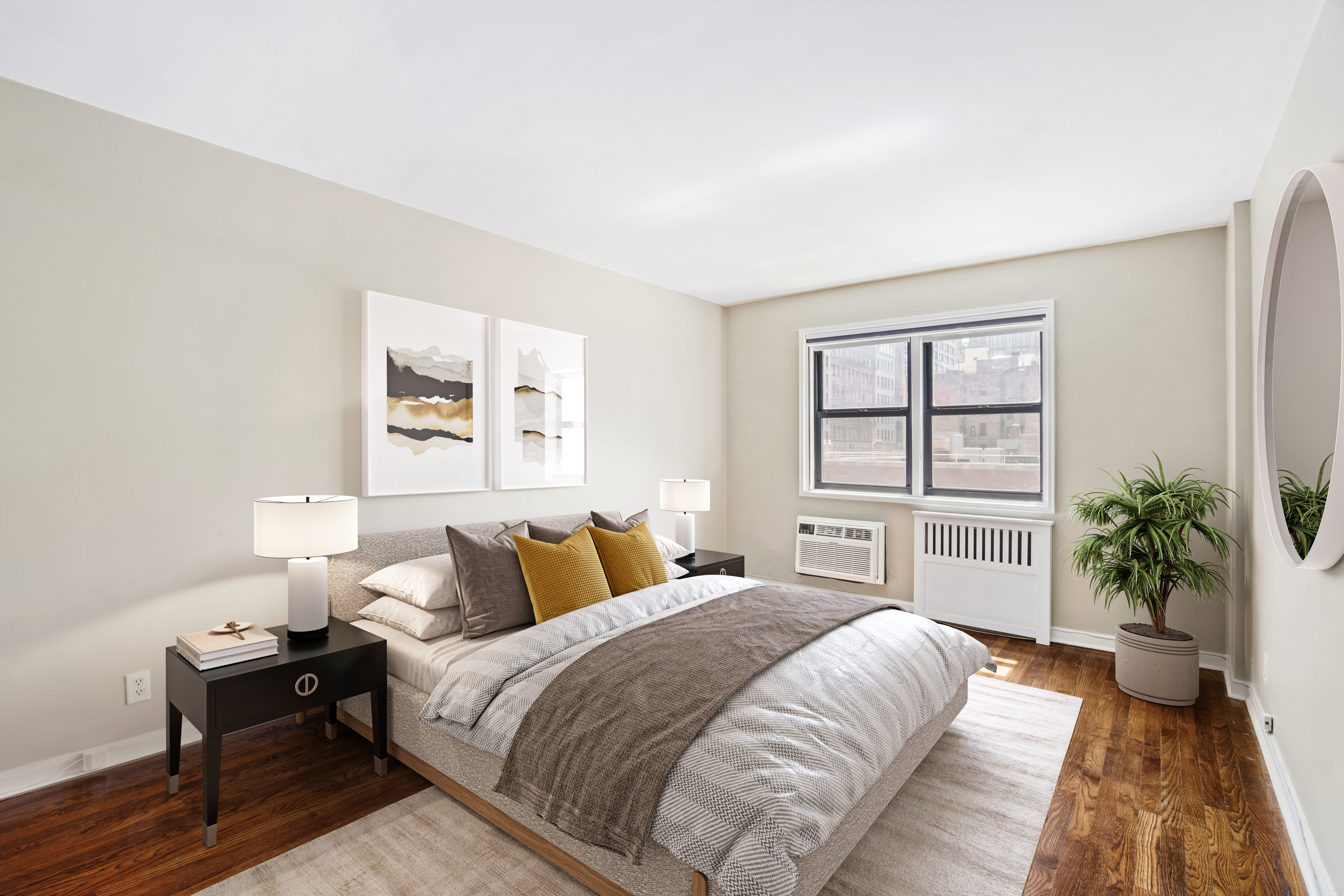 140 7th Avenue, Unit 4J Manhattan, NY 10011 - Photo 5 of 8 a bedroom with a large bed and a couch