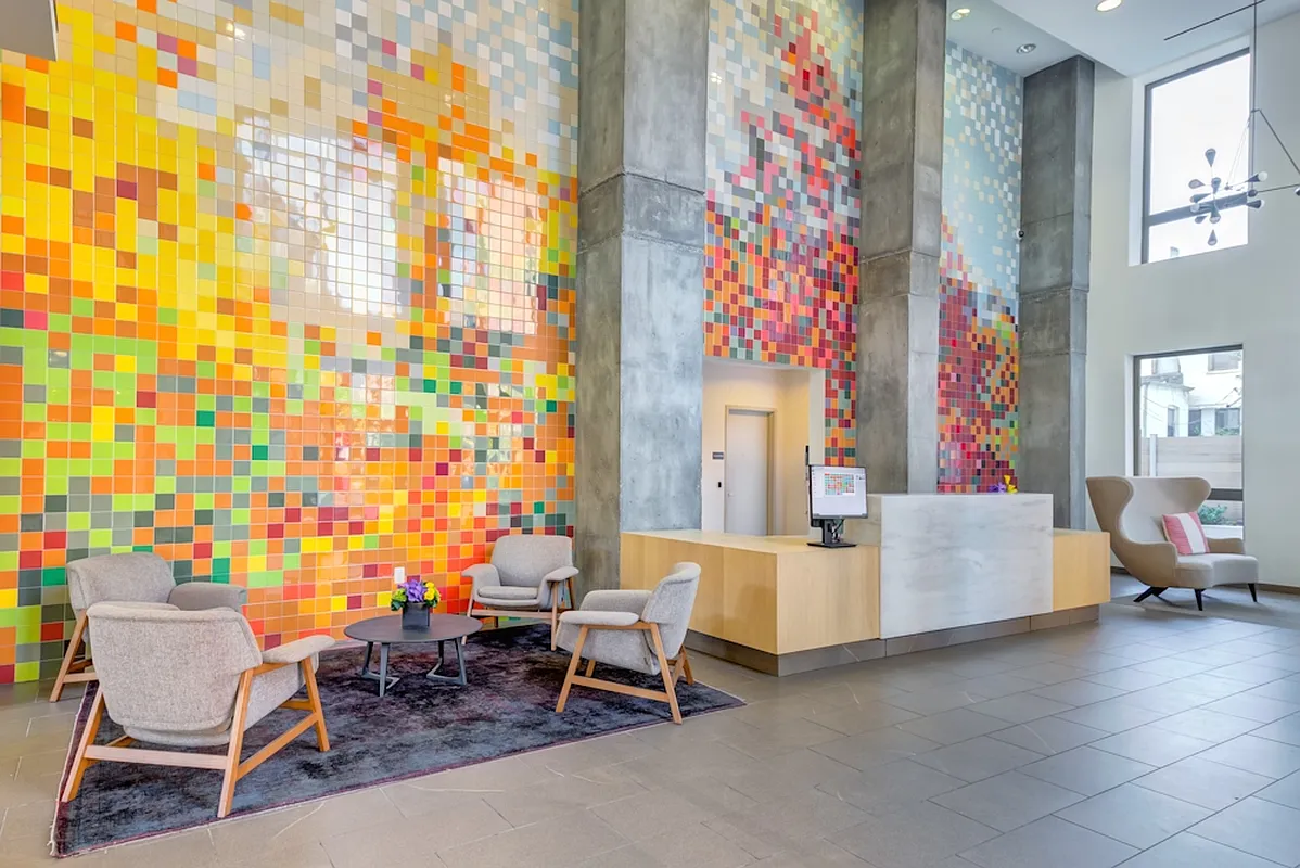 626 Flatbush Avenue, Unit 7E Brooklyn, NY 11225 - Photo 17 of 23 a living room with furniture and a window