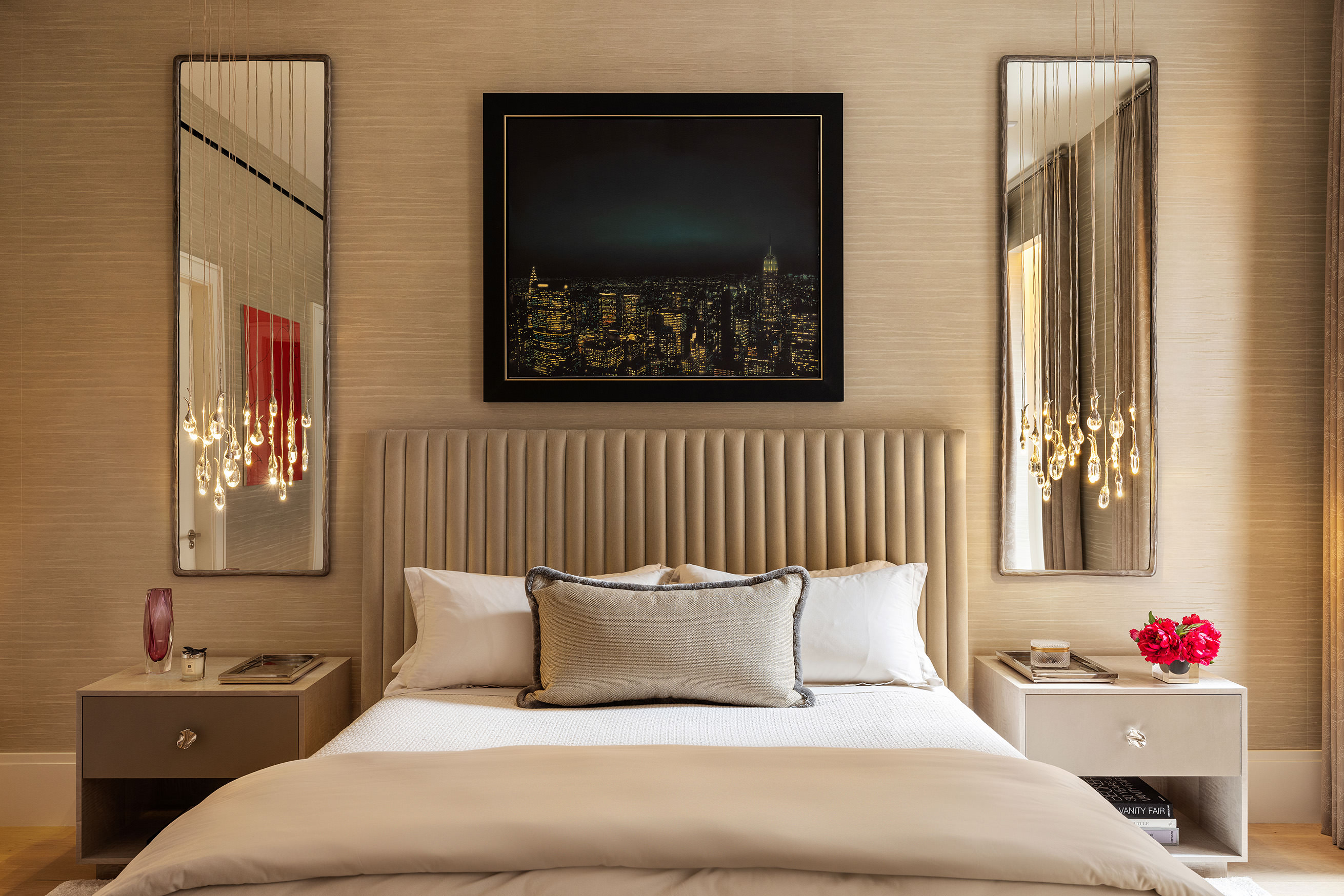 53 Greene Street, Unit 3 Manhattan, NY 10013 - Photo 13 of 22 a bedroom with a bed and a painting on the wall