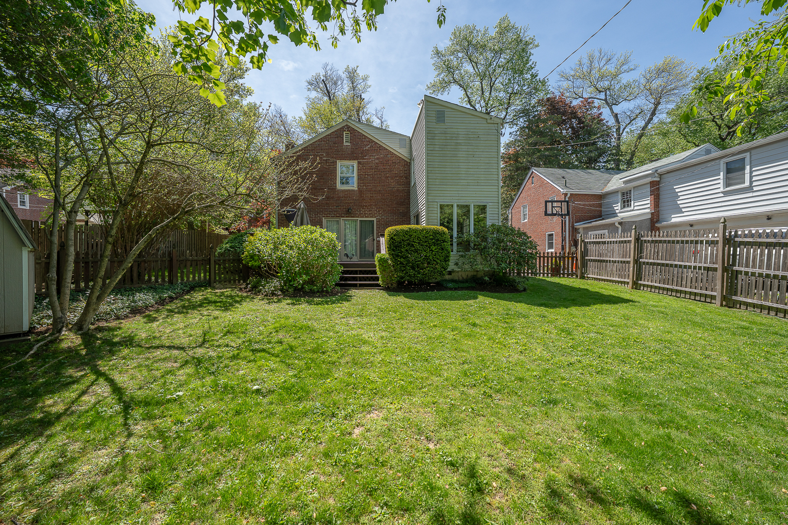 519 Mercer Road Merion Station, PA 19066 - Photo 48 of 58 a view of a garden with a house in the background