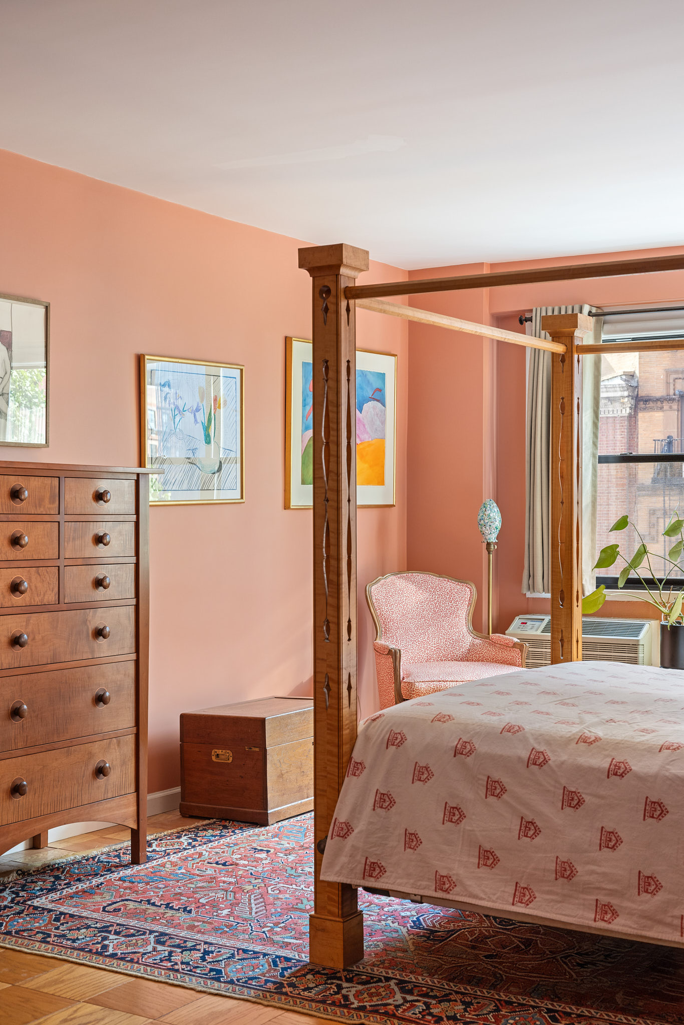 31 Jane Street, Unit 3H Manhattan, NY 10014 - Photo 7 of 14 a bedroom with a bed and a dresser