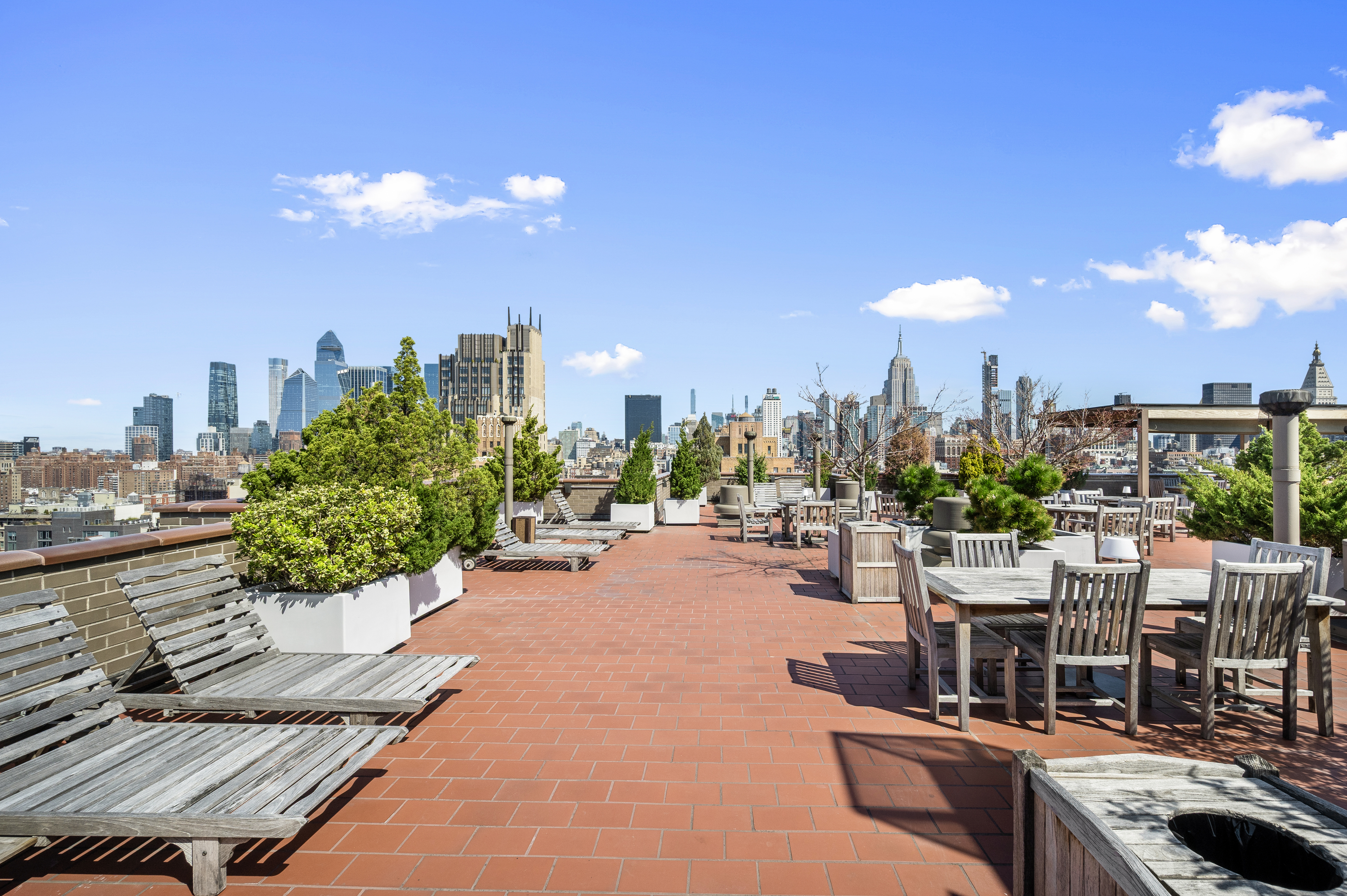 77 7th Avenue, Unit 10N Manhattan, NY 10011 - Photo 12 of 13 a view of a terrace with sitting area
