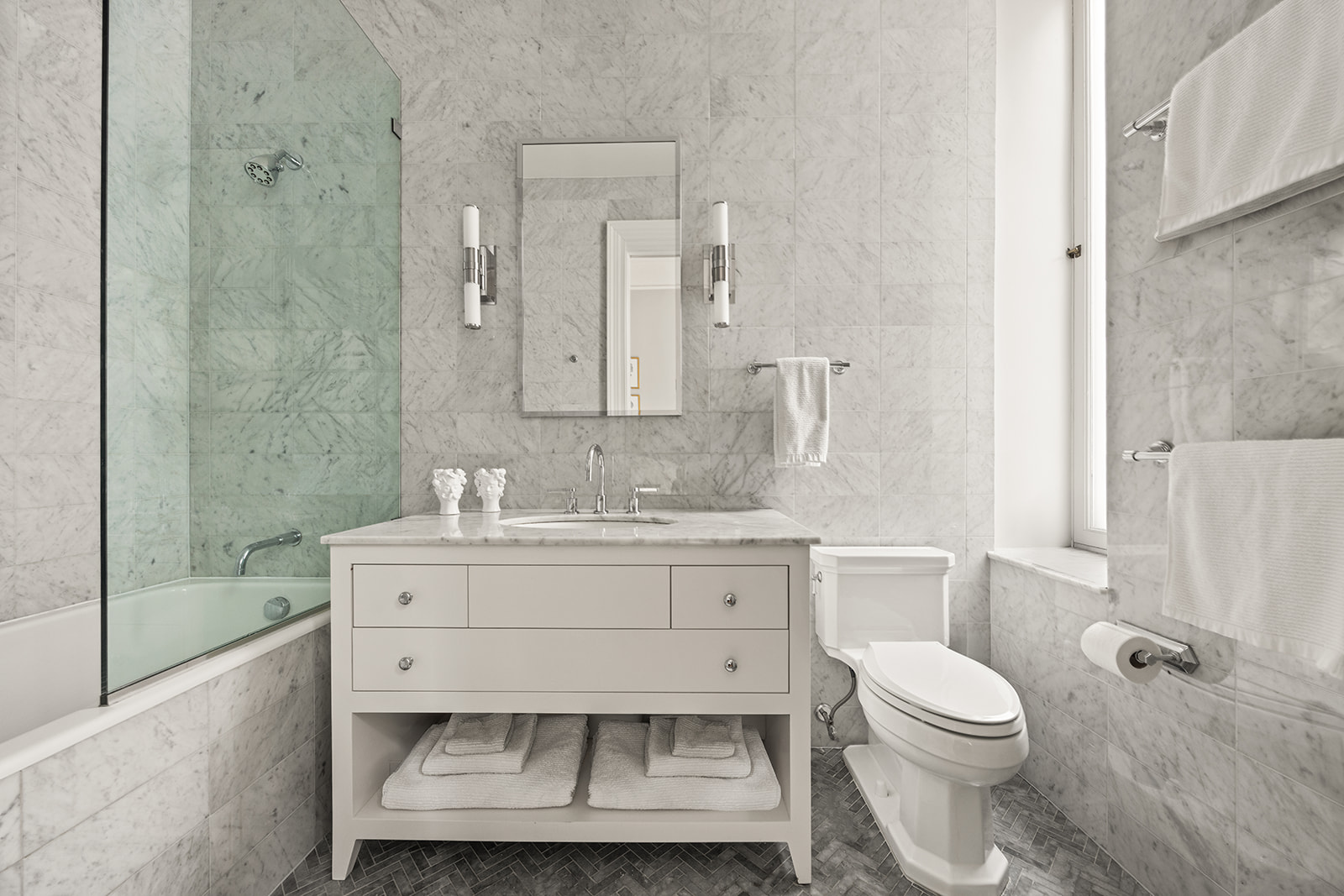 895 West End Avenue, Unit 1B Manhattan, NY 10025 - Photo 11 of 23 a bathroom with a sink toilet a shower and bathtub