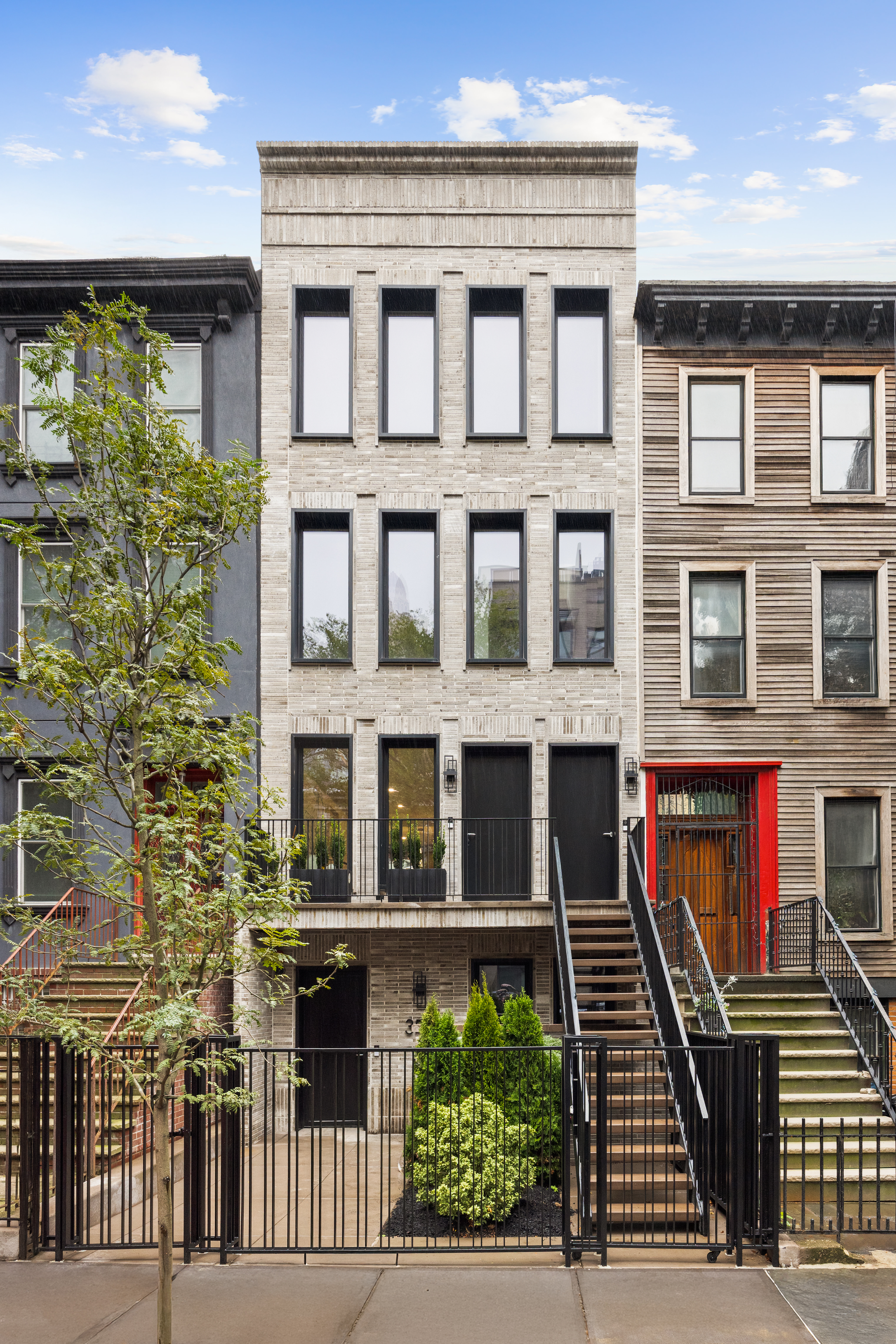 354 Dean Street, Unit 2 Brooklyn, NY 11217 - Photo 9 of 10 a front view of a building with glass windows