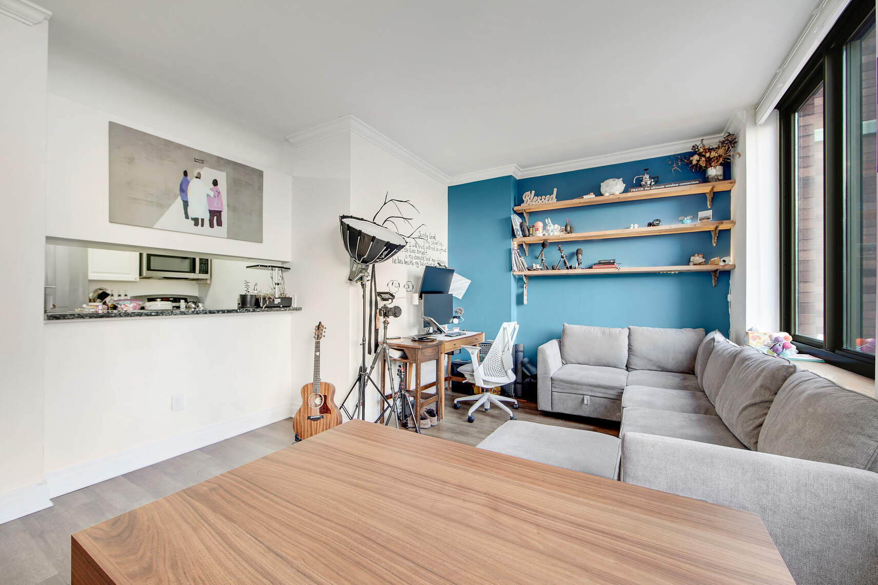400 East 90th Street, Unit 9A Manhattan, NY 10128 - Photo 3 of 11 a living room with furniture and a wooden floor