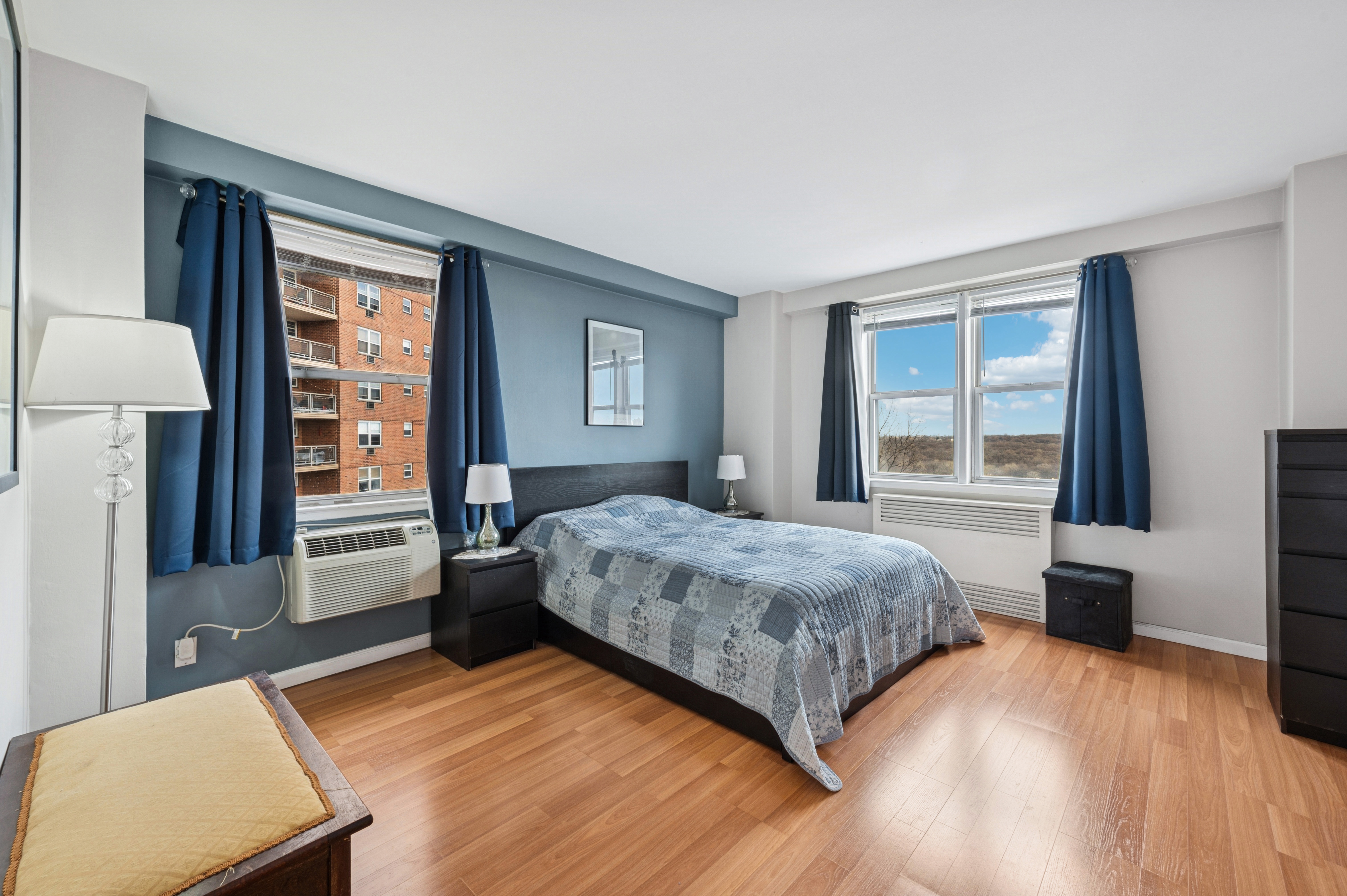 5700 Arlington Avenue, Unit 7G Bronx, NY 10471 - Photo 4 of 16 a bedroom with a large bed and a window